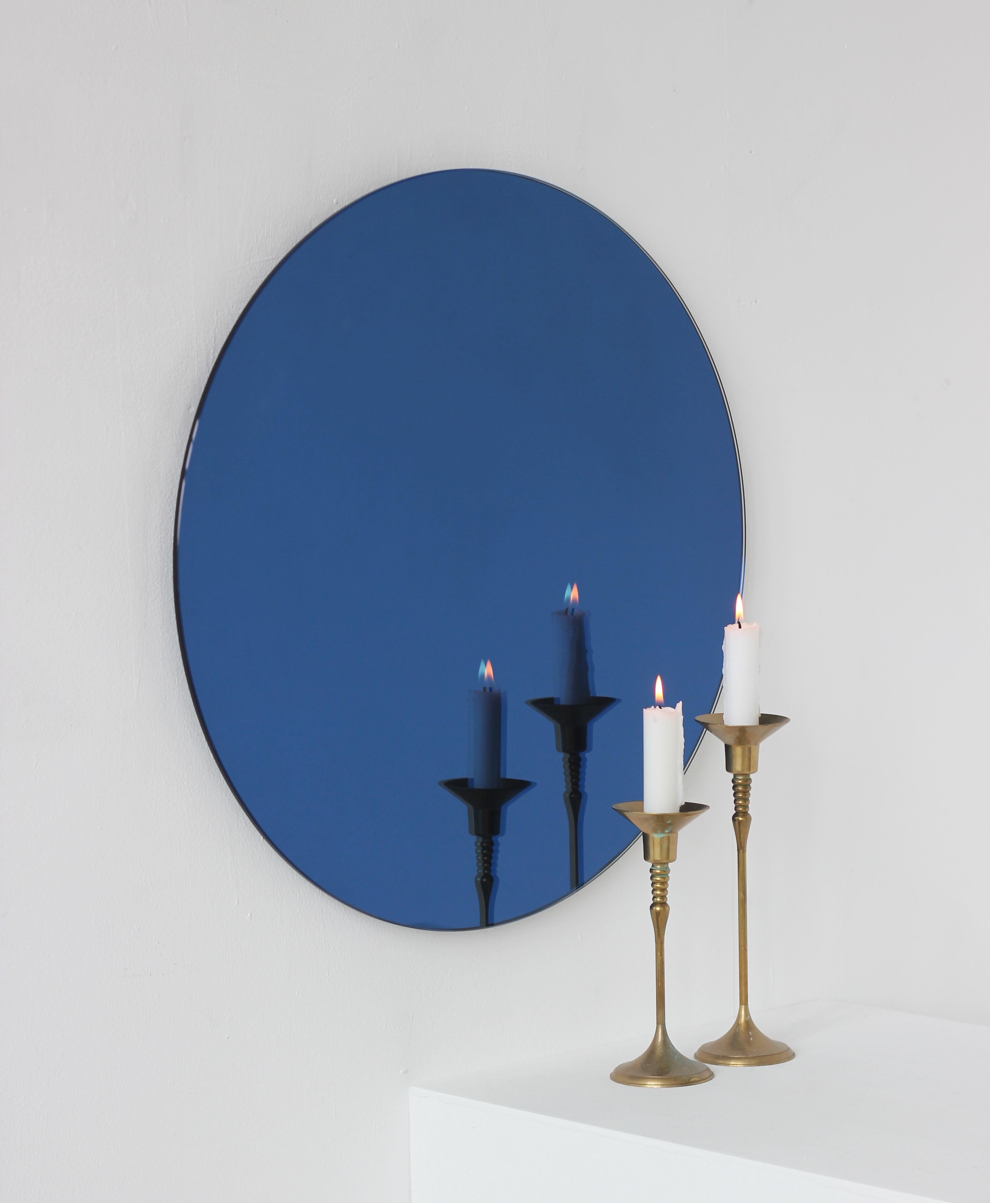 British Orbis Blue Tinted Round Contemporary Frameless Mirror, Medium For Sale
