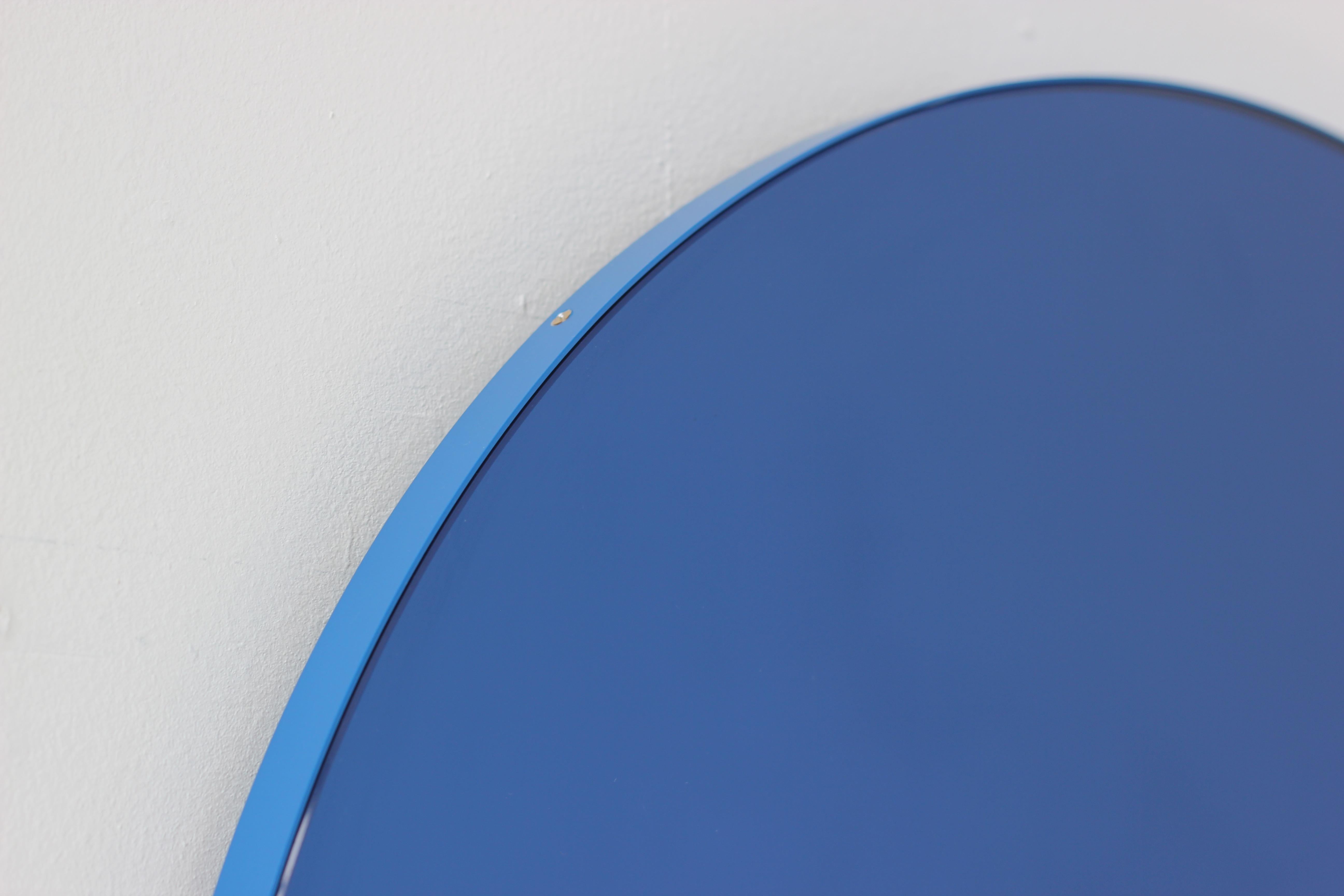 Powder-Coated Orbis Blue Tinted Round Mirror with a Modern Blue Frame, Small For Sale