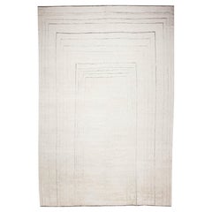 Tappeto minimalista bohémien a pelo basso in lana shag annodato a mano color crema avorio - In magazzino