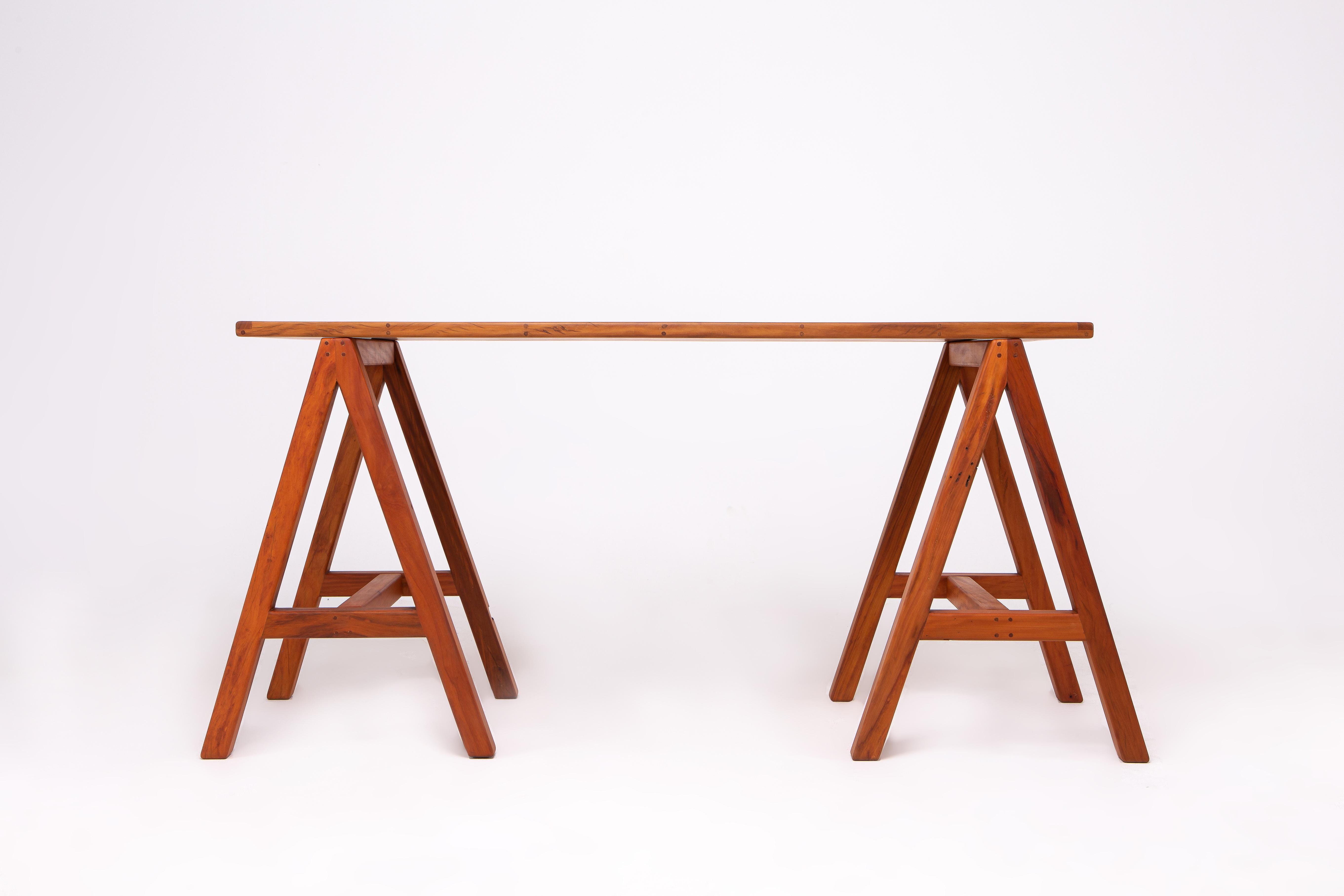 Glória is a minimal working desk designed to offer great usability and pleasure.

The aesthetics proposes a clean yet strong approach using the classic trestle structural system.

The whole piece, including the wooden top is all solid and