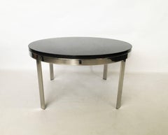 Table basse minimaliste Brueton en acier inoxydable poli et granit