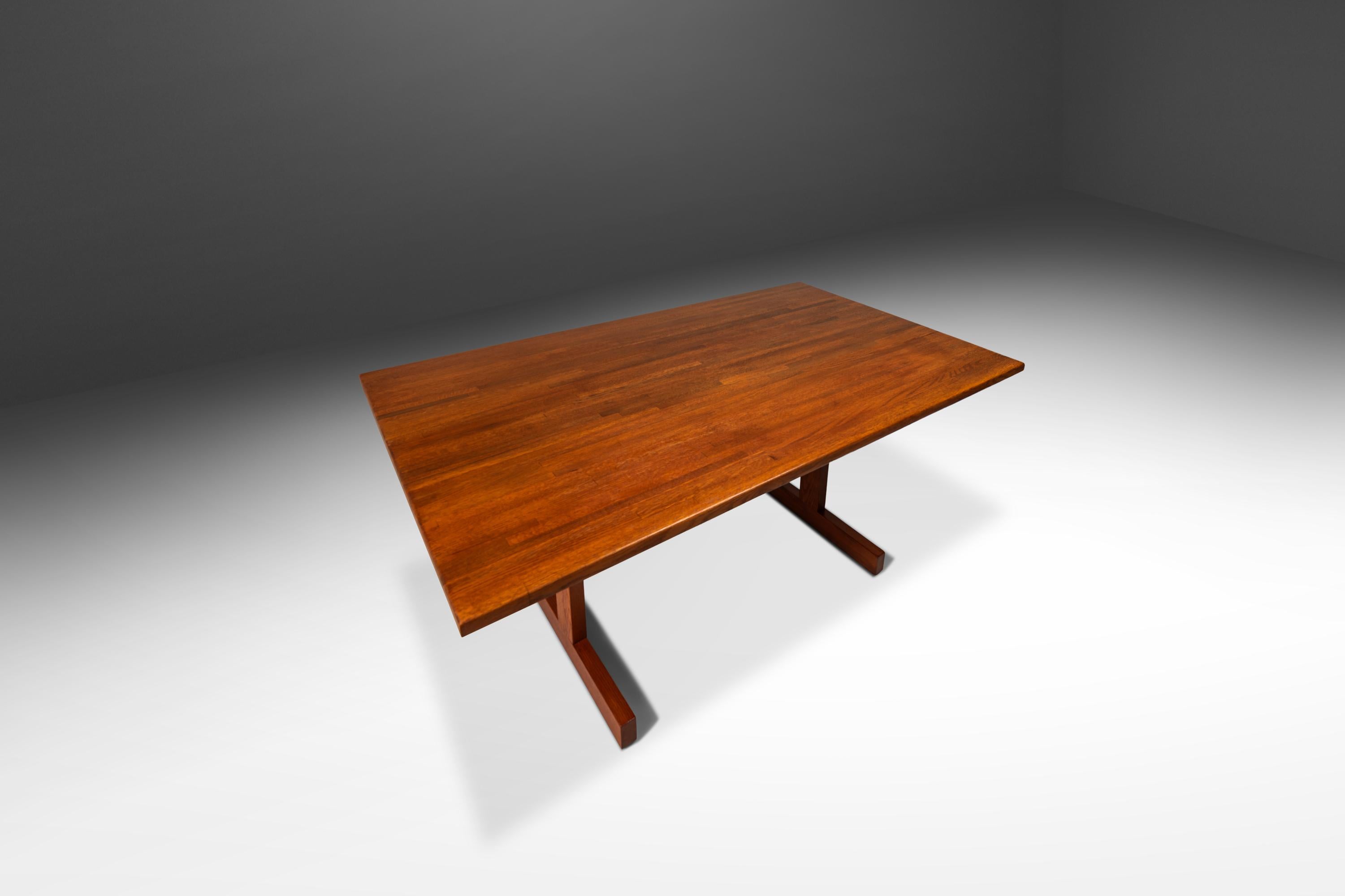 Simultaneously understated and visually arresting this gorgeous Danish-made table is the epitome of Danish Minimalism. Constructed entirely from solid oak from top to bottom featuring out-of-this-world woodgrains, colors and patterns this versatile