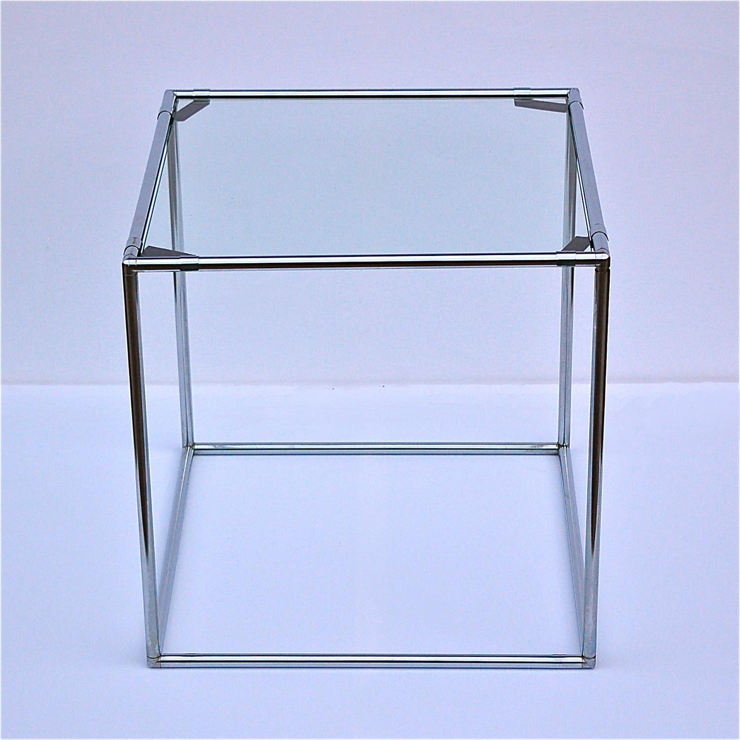 Vintage, 1960s side table, designed by Poul Cadovius for Abstracta System. Square, chromed tubular metal structure with glass plate, glass top. The minimalistic design of this table creates a perfect harmony between form and function. Although