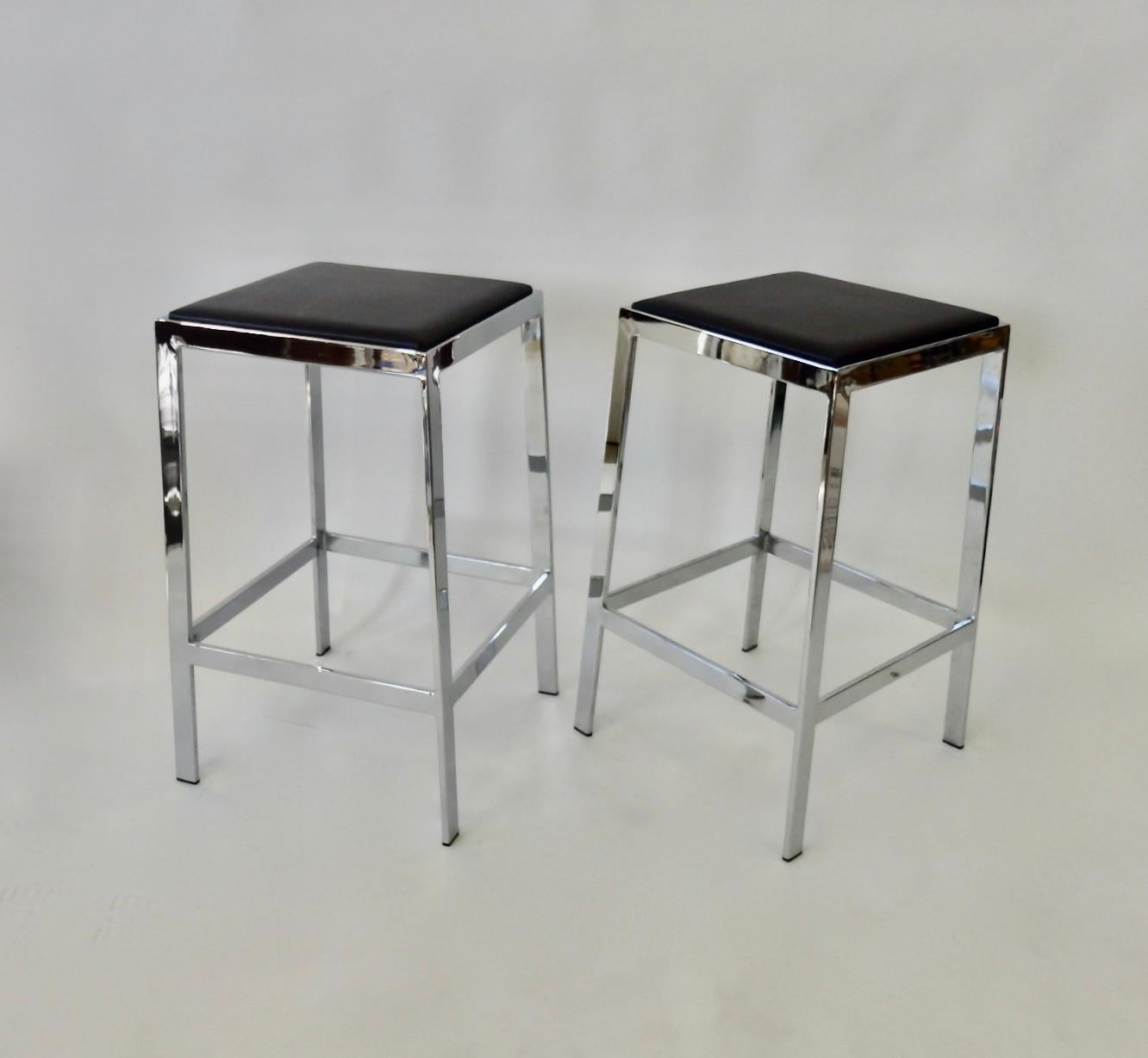 Pair of well-designed modernist bar or counter stools.