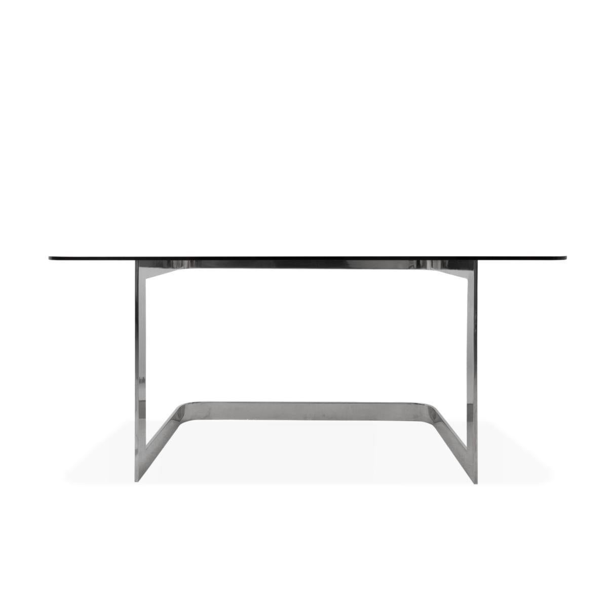 Chrome desk with glass top in the style of Milo Baughman, USA, circa 1970.

Measures: L 60.0