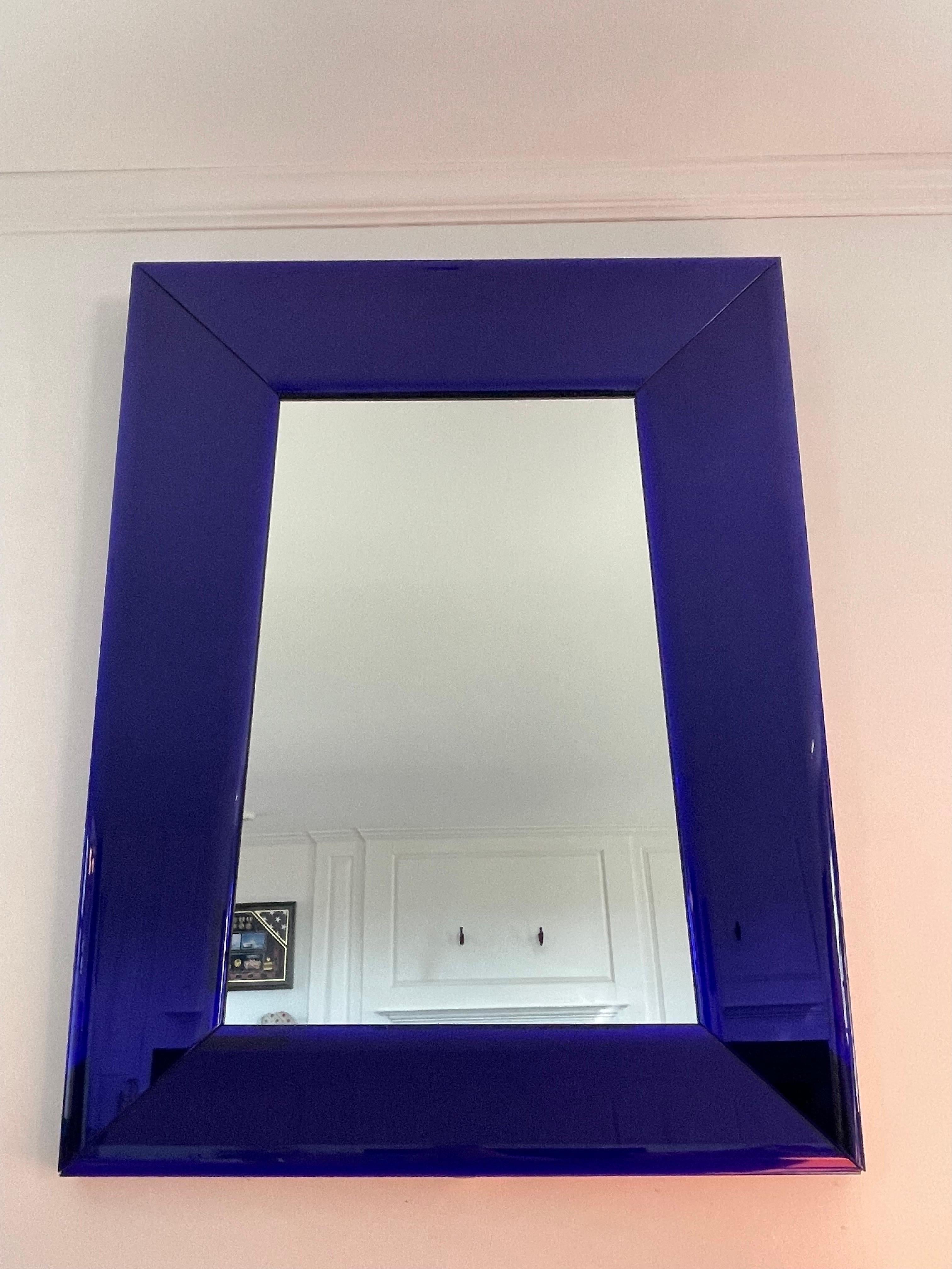 dark blue framed mirror