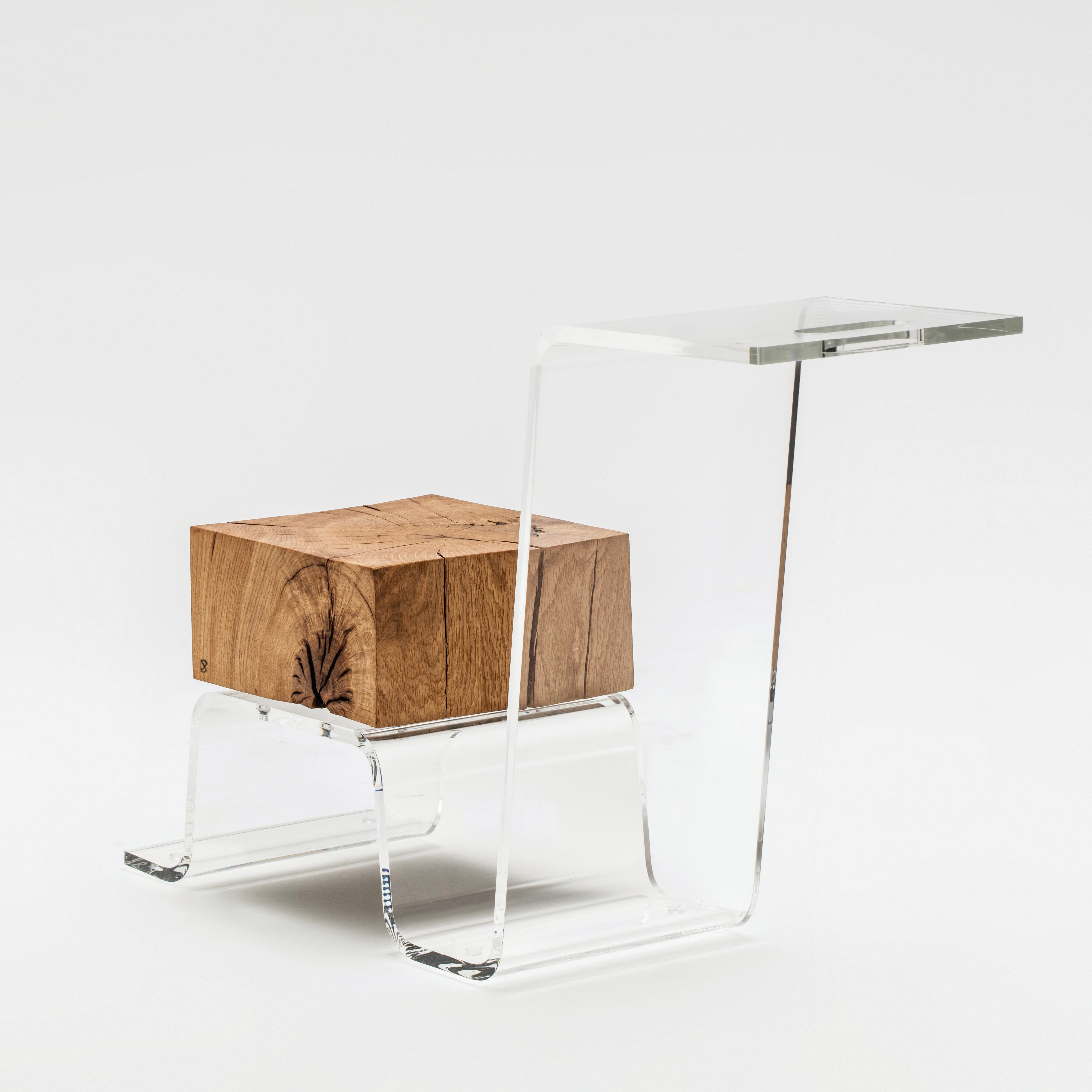 THE LINE PERSPEX coffee table

The swan shaped table made of the combination of the reclaimed 300/400-year-old oak and perspex. 
The table has the precisely cut out handle at the top platform ensuring the effortless portability and the functional