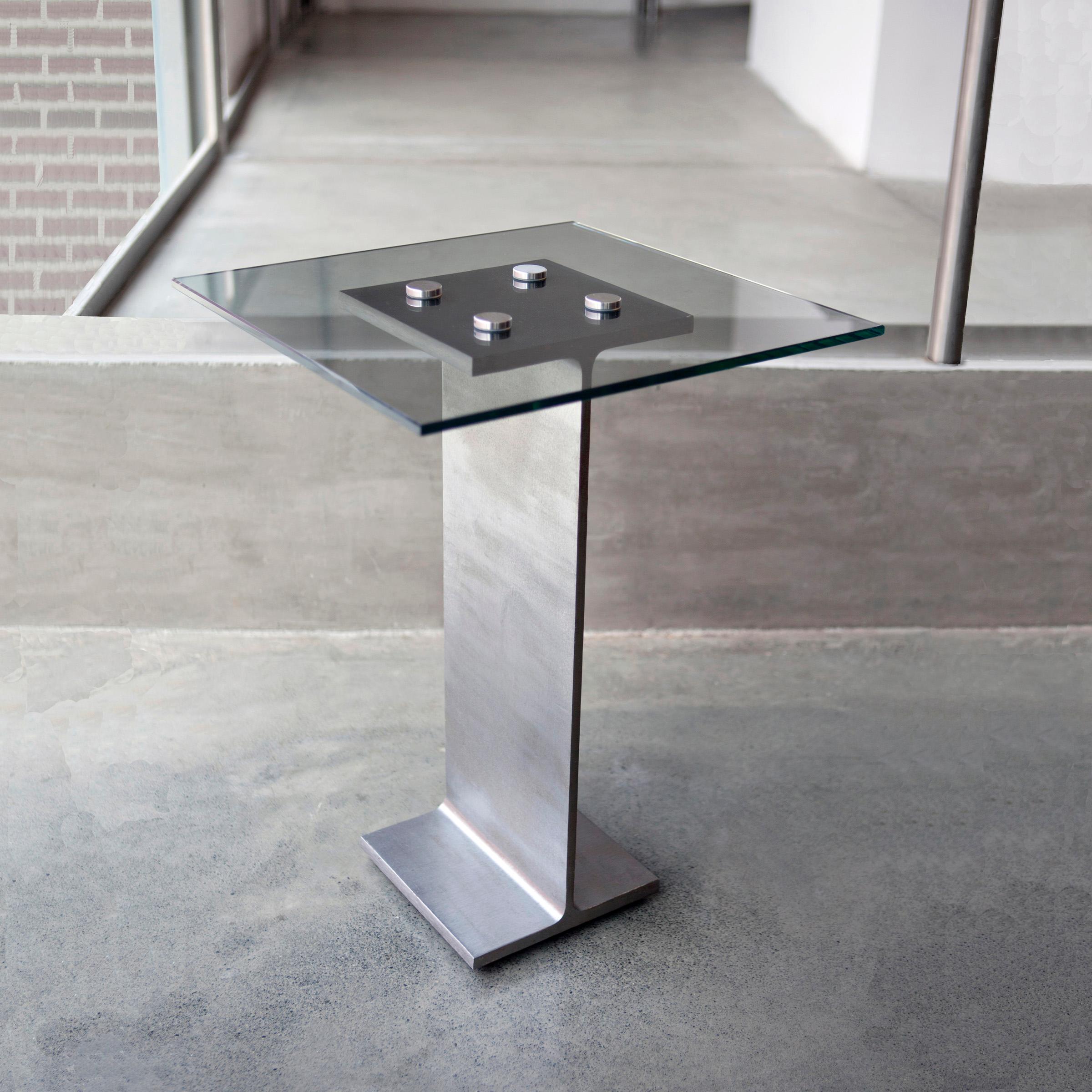 The Mid-Rise Side Table 

Command a sleek and refined level of minimalism, elegance, and proportion in your designer home or hotel lobby with this sophisticated side table or use as a modern nightstand lamp table next to your modernist bed.  The