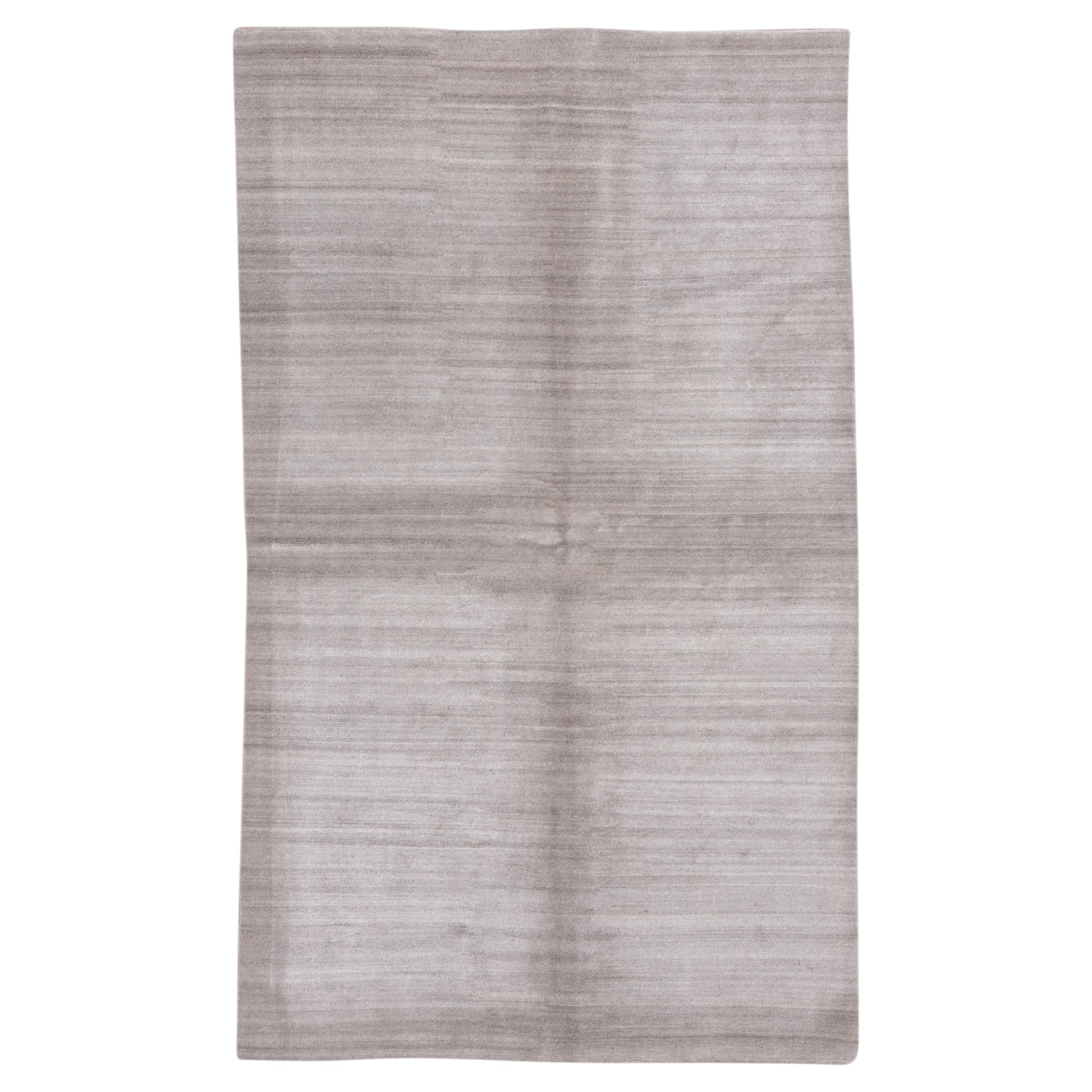 Minimalist Contemporary Tibetan Wool Rug in Soft Silver Gray For Sale