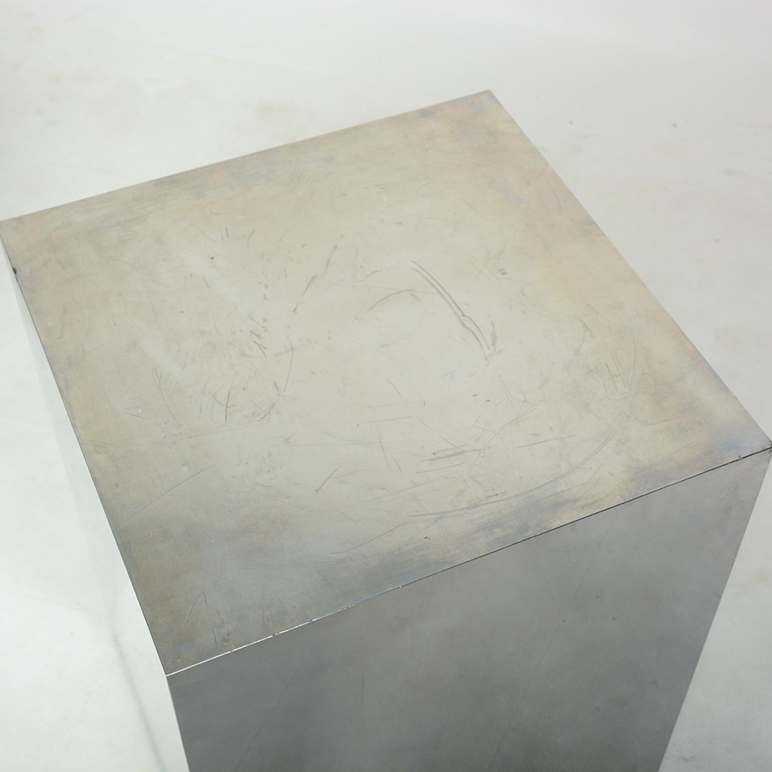 For your consideration: Mid-Century Modern Minimalist design, cube block side tables in stainless steel chrome finish
Similar to Paul Evans American Cityscape Cube style, 1970s, USA.

Dimensions: 19 3/4