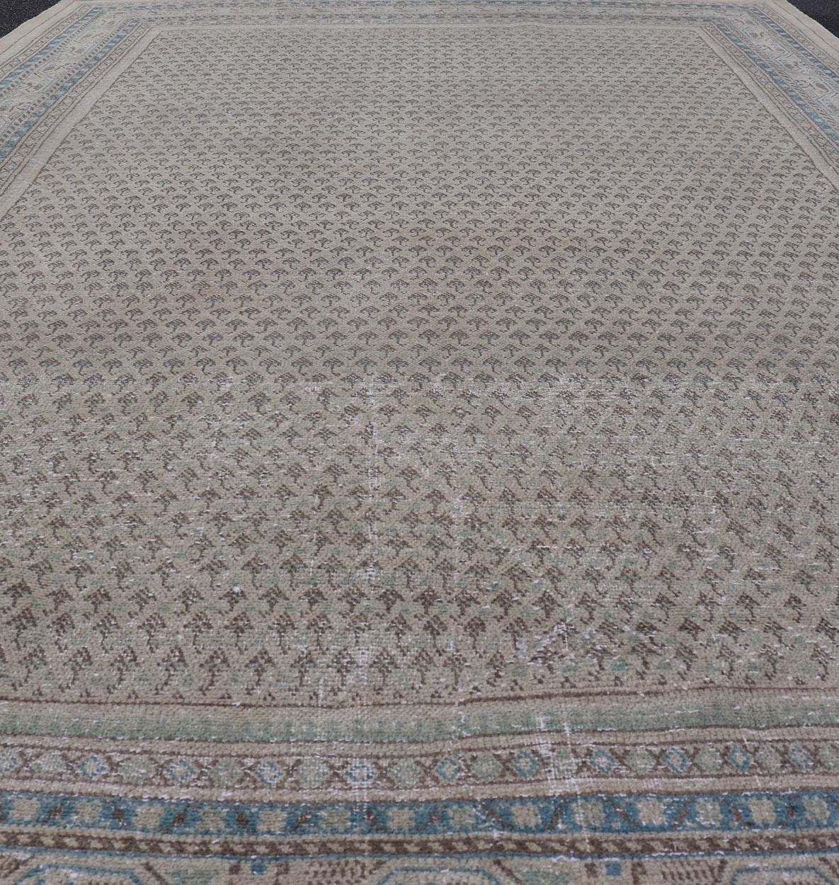 Minimalist Design Vintage Persian Tabriz Rug with All-Over Small Scale Design. Keivan Woven Arts / rug MSE-1553, country of origin / type: Iran/ Tabriz, circa 1960.
Measures: 6'6 x 10'7 
This Tabriz rug features a relatively intricate and detailed