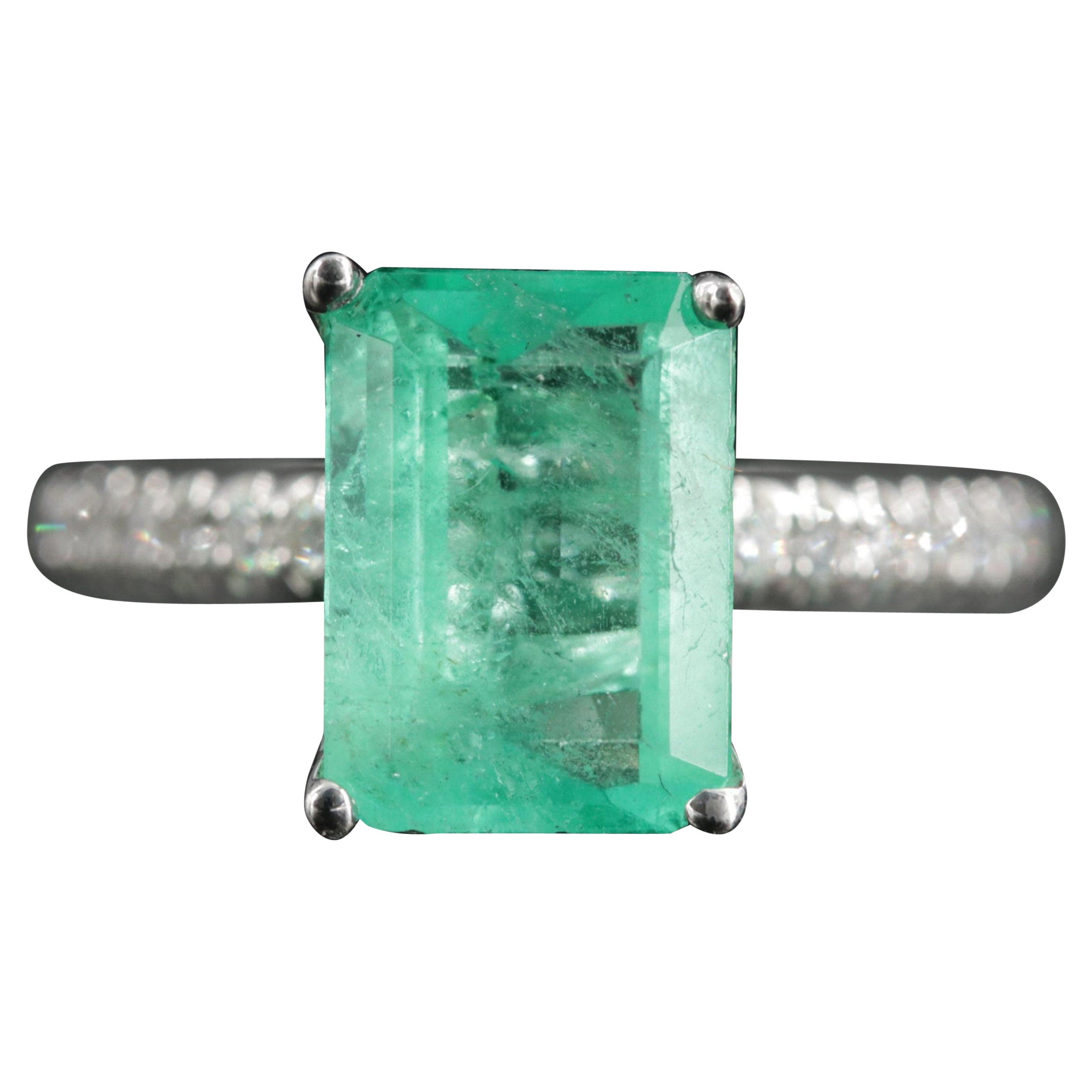 For Sale:  Minimalist Emerald Cut Emerald Diamonds Engagement Ring