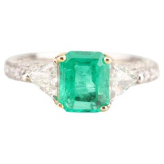Minimalist Emerald Cut Emerald Diamonds Engagement Ring