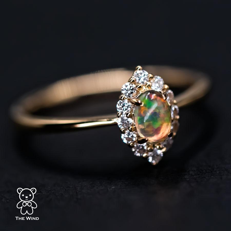 Artist Minimalist Fire Opal Marquise Shaped Halo Diamond Engagement Ring For Sale