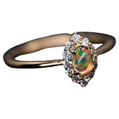 Minimalist Fire Opal Marquise Shaped Halo Diamond Engagement Ring
