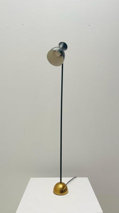 Minimalist floor lamp by Dieter Schulz