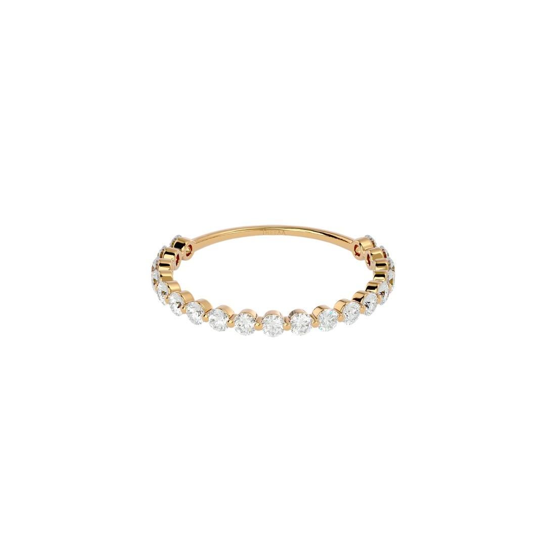 Elements
Truly timeless, this exquisite minimalist half eternity wedding ring will be your sentimental keepsake for life. Its one-of-a-kind design of golden and brilliant diamond elements is adorned with dazzling round brilliant stones, giving you a
