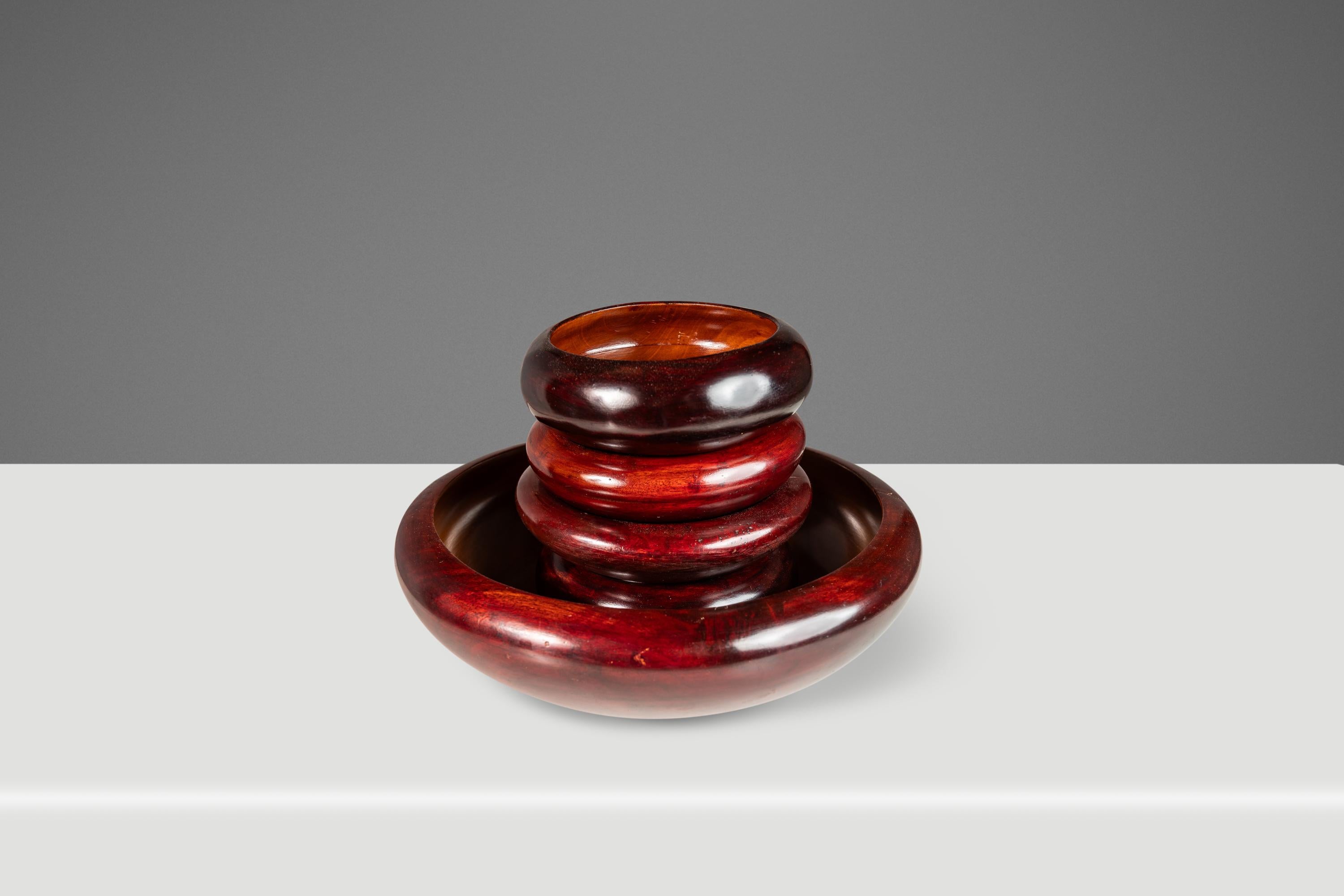 Introducing a gorgeous, hand-turned and hand-polished set of serving bowls carved from solid cherry wood. Featuring stunning woodgrains inside and out and each with their own unique shape and characteristics this serving set if perfect for