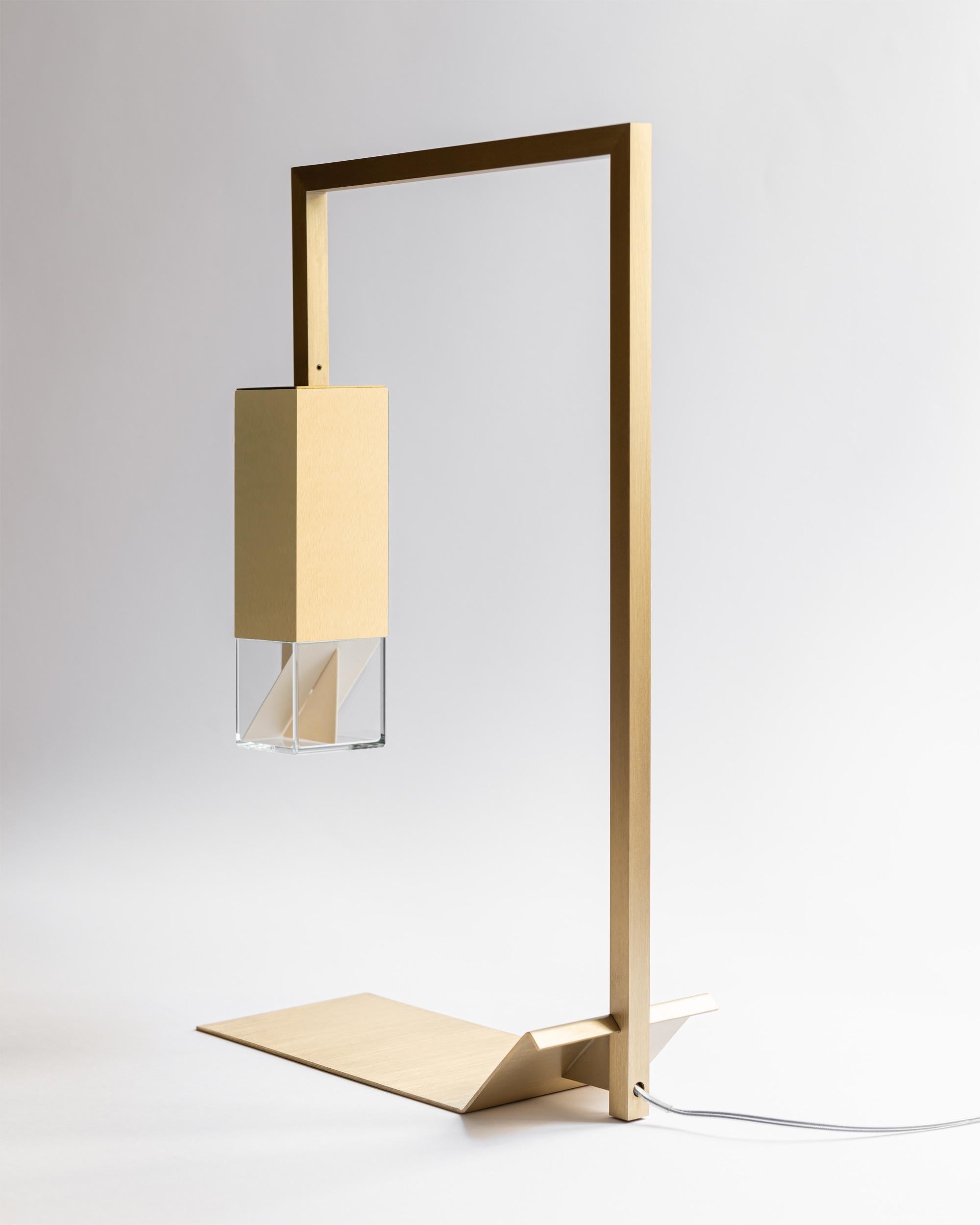 About
Modern Minimalist Handmade Brass Table Lamp by Formaminima

Lamp/Two Brass
Design by Formaminima
Table Light
Materials:
Body lamp handcrafted in solid brass golden satin finish / crystal glass diffuser hosting Limoges biscuit-finish porcelain