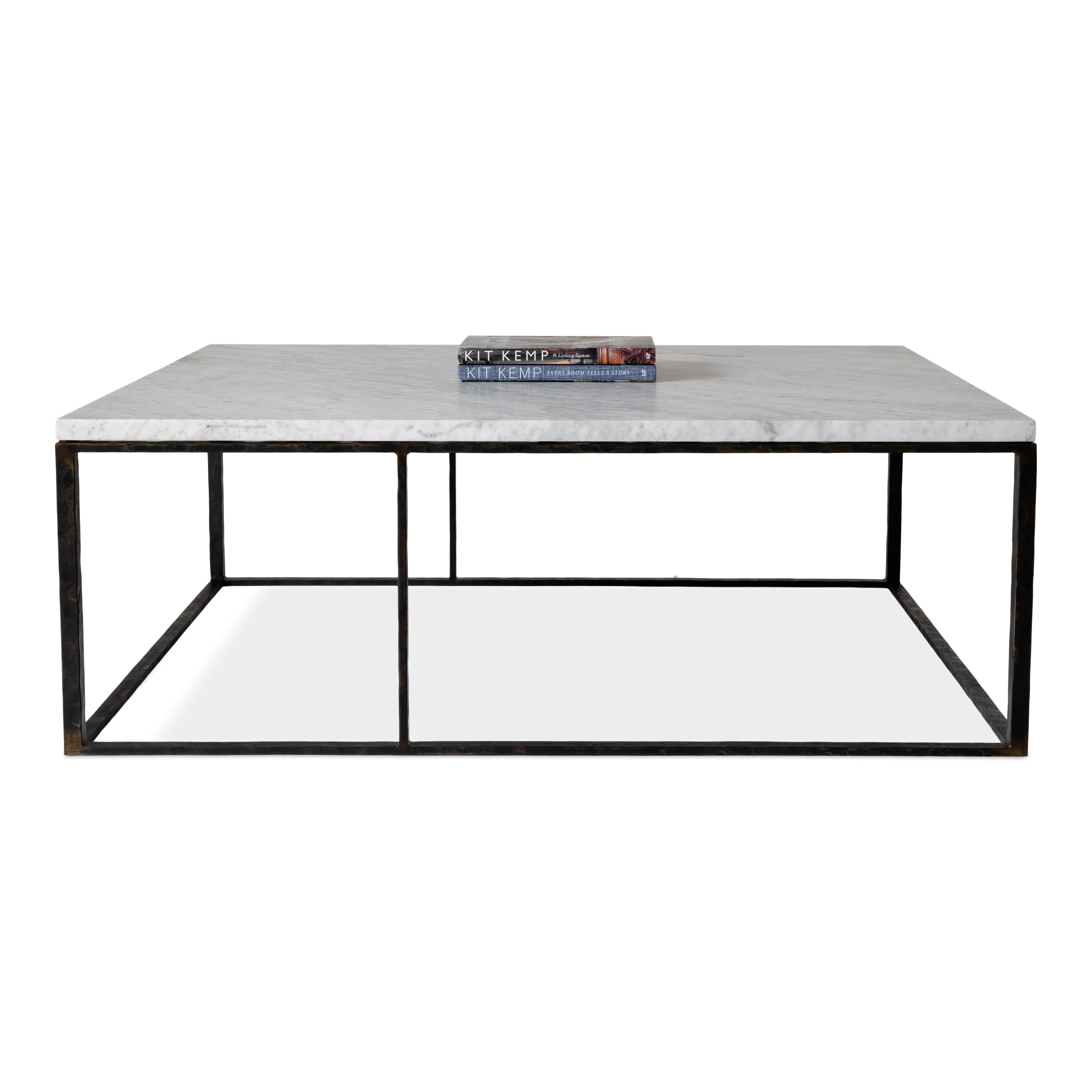 Minimalist coffee table with honed carrara marble with textured metal base.

Designed by Brendan Bass for the Vision and Design Collection, by using high quality materials and textures. All materials are sourced from local vendors throughout the