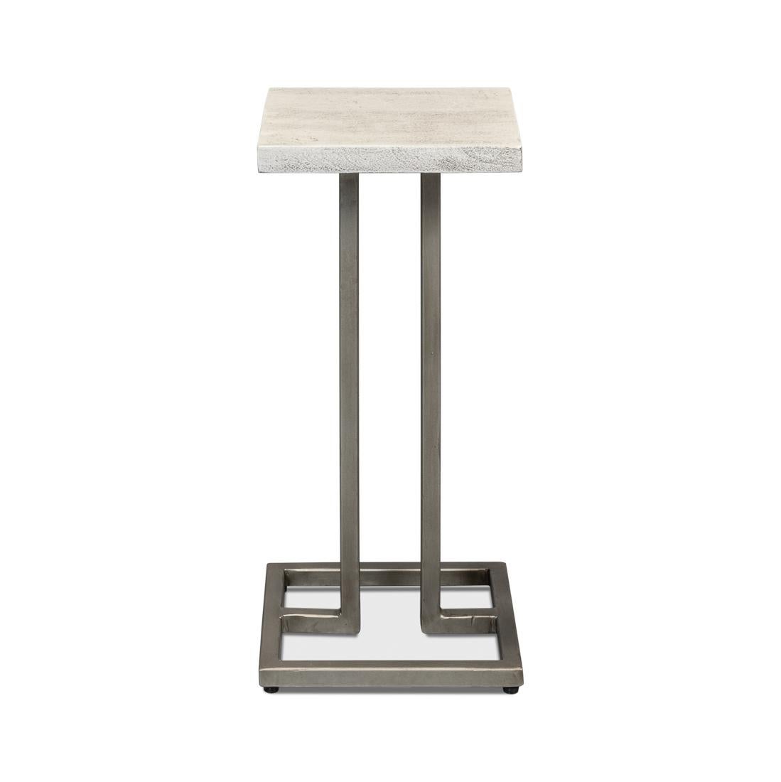 A seamless blend of industrial charm and contemporary flair. This table boasts a gray-white square wooden top that lends a modern, textured appeal, perfect for those who covet an edgy, yet elegant aesthetic.

Supported by a sleek, geometric metal