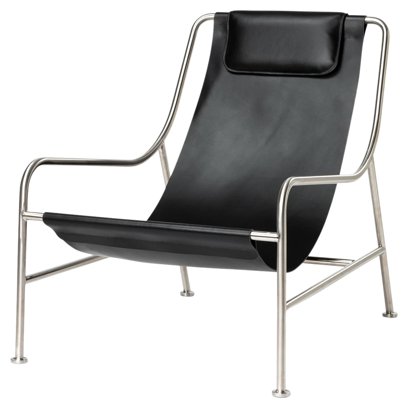 Sedia da salotto moderna e minimalista in pelle nera e acciaio inox lucidato