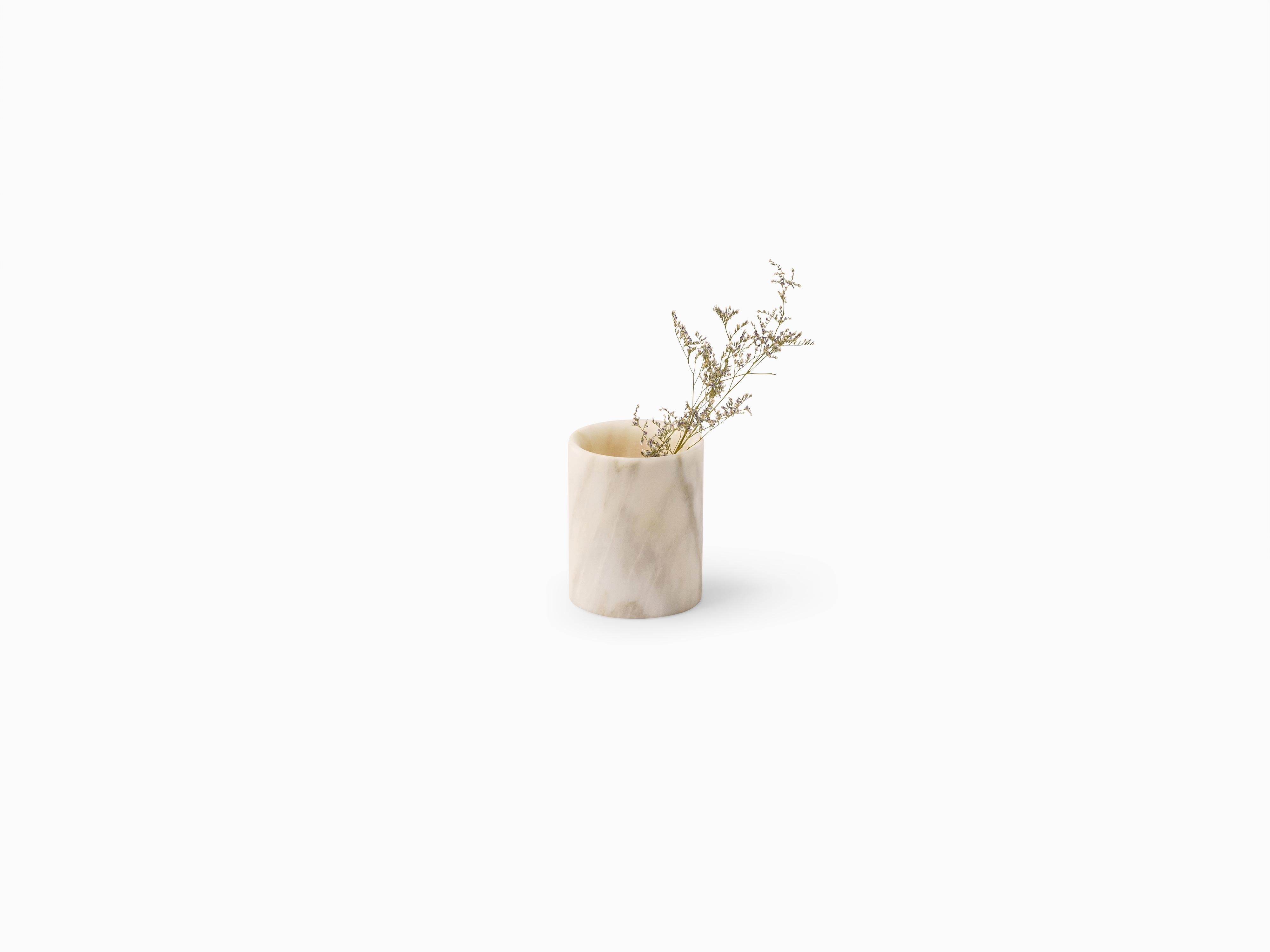 Born of the natural characteristics of Estremoz marble, the AMA vases are an elegant and simple display for fresh flowers, dried botanicals, or faux blooms, among many other uses. Manuel Aires Mateus imagined a vase showing an unexpected material