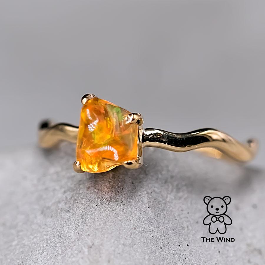 Minimalist Mexican Fire Opal Wedding Band 18K Yellow Gold.


Free Domestic USPS First Class Shipping! Free Gift Bag or Box with every order!

Opal—the queen of gemstones, is one of the most beautiful gemstones in the world. Every piece of opal is