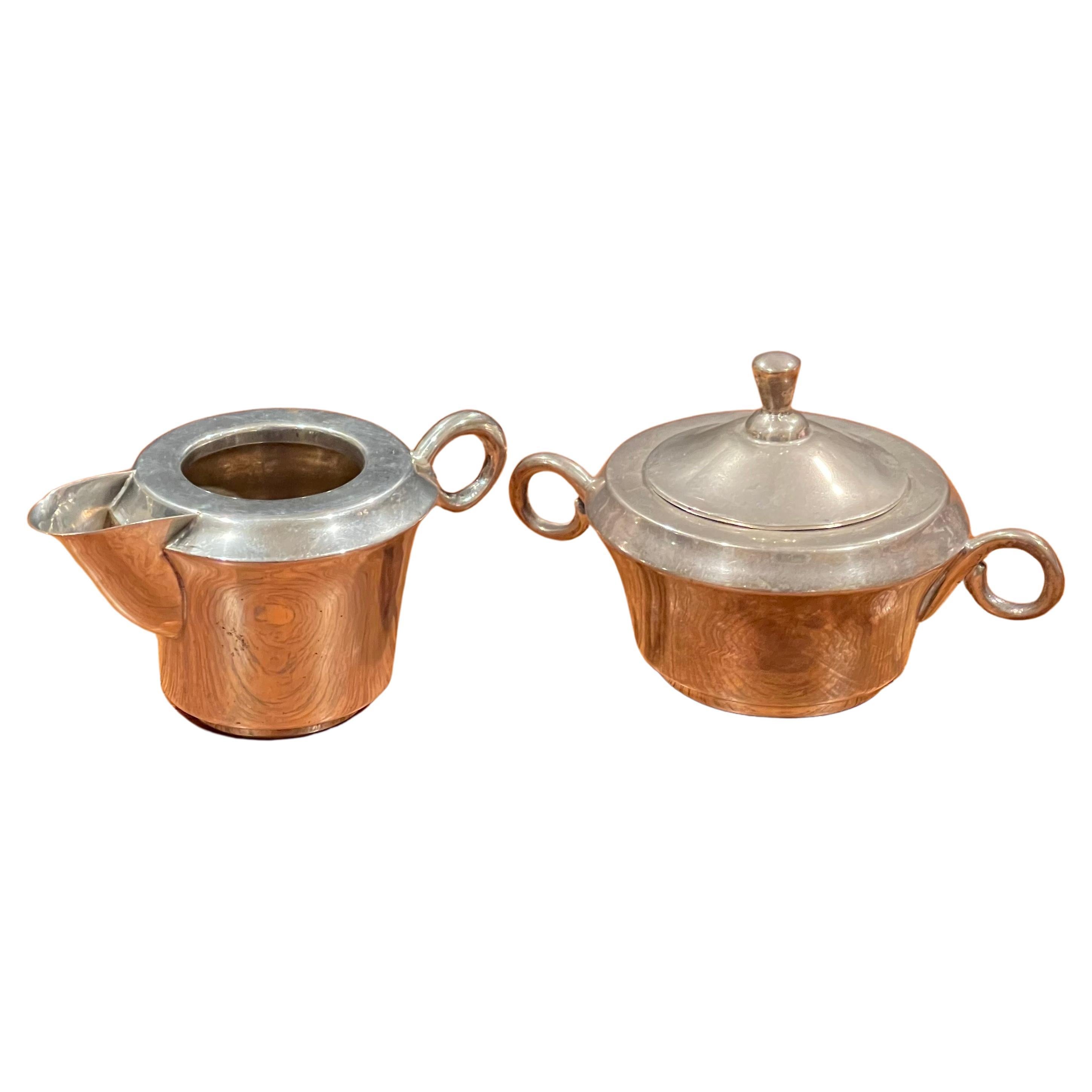 Striking minimalist Mexican sterling silver cream and sugar set by Anfer, circa 1960s. The highly crafted two-piece set is in very good vintage condition and measures 5.5