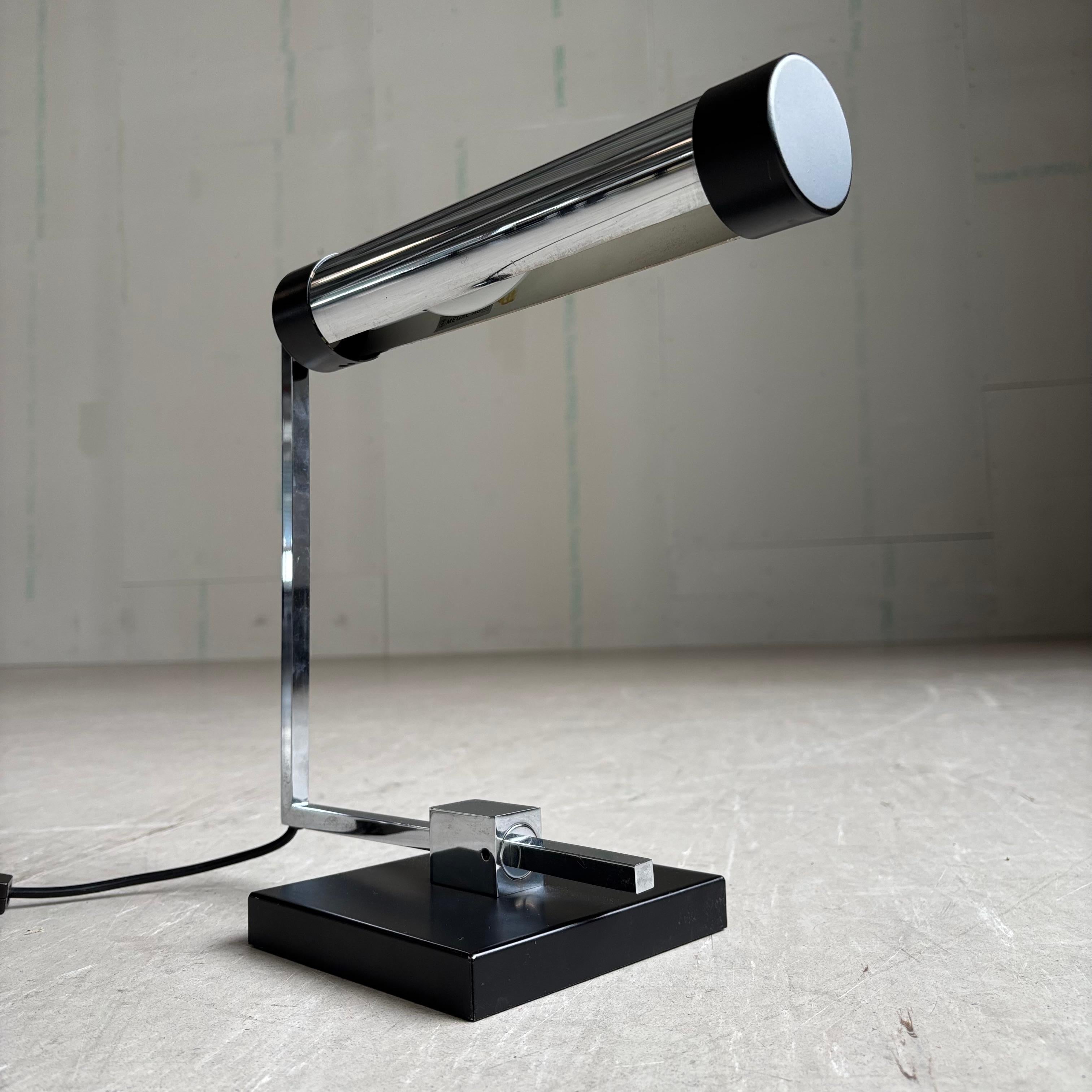 Late 1950’s, early 1960’s Minimalist Desk / Table Lamp with tilting and turning rotary shade by Megal AG, Switzerland. Very rare model. Swiss design and manufacture.
Design: Megal AG, Switzerland
Produced: Megal AG, Switzerland
Measurements: Height:
