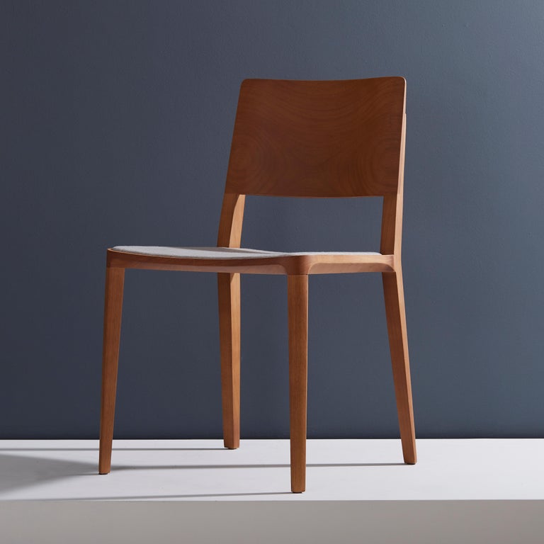Evo Chair collection.

Our Evo collection is based in the harmonic fusion between geometrical forms and the modern interpretation of wood archetypes. 

All elements that compose the chair are precisely engineered to input full hardwood blocks to