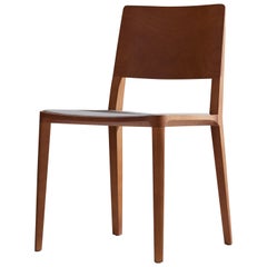 Minimalist Modern Chair in Natural Solid Wood Upholstered Textile Seating
