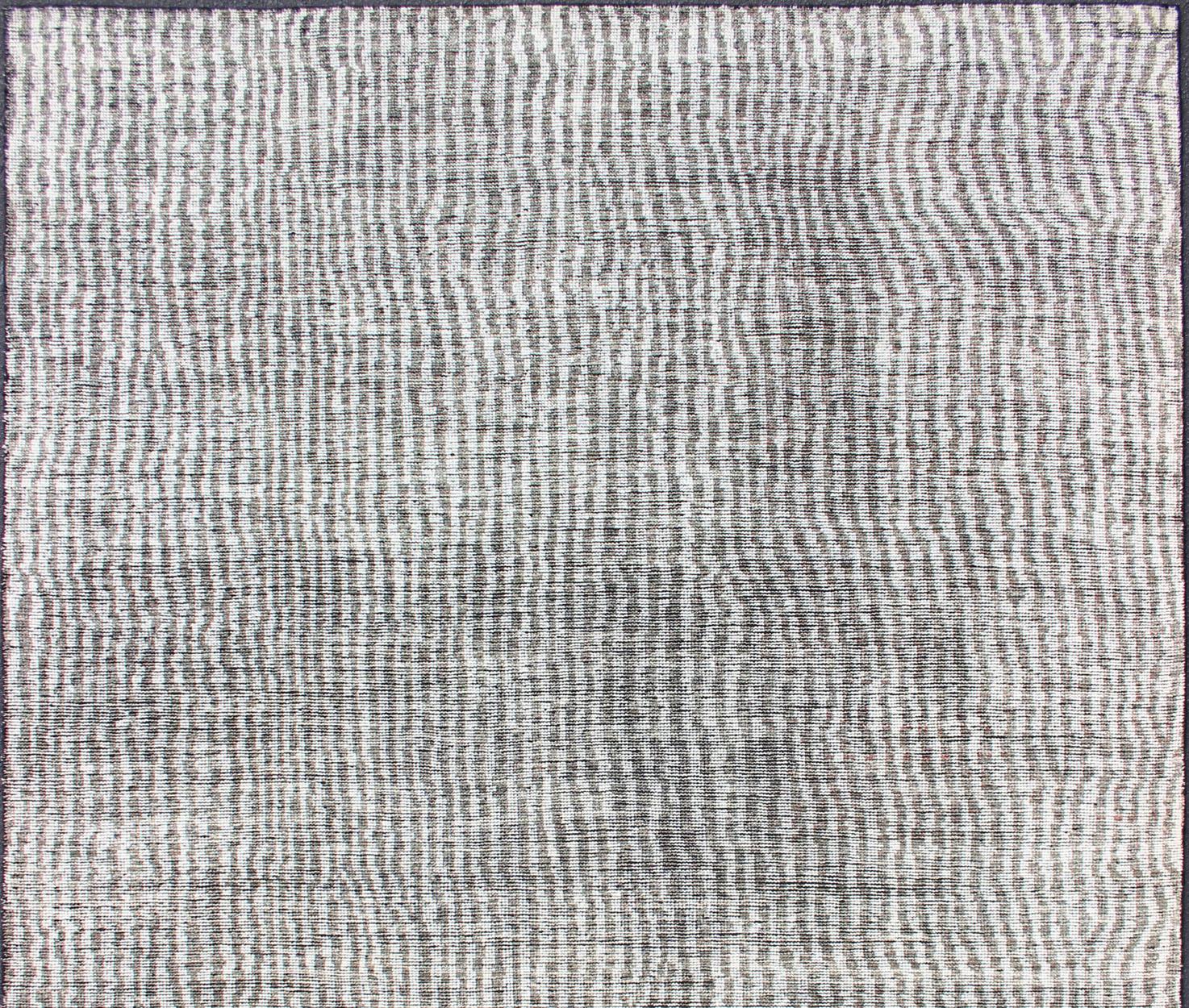 Shades of white and taupe/green modern distressed piled rug, Keivan Woven Arts rug KHN-1030-TR-578, country of origin / type: India / Distressed Modern Piled Rug.

This distressed modern design is inspired by minimalism in modern design. With a