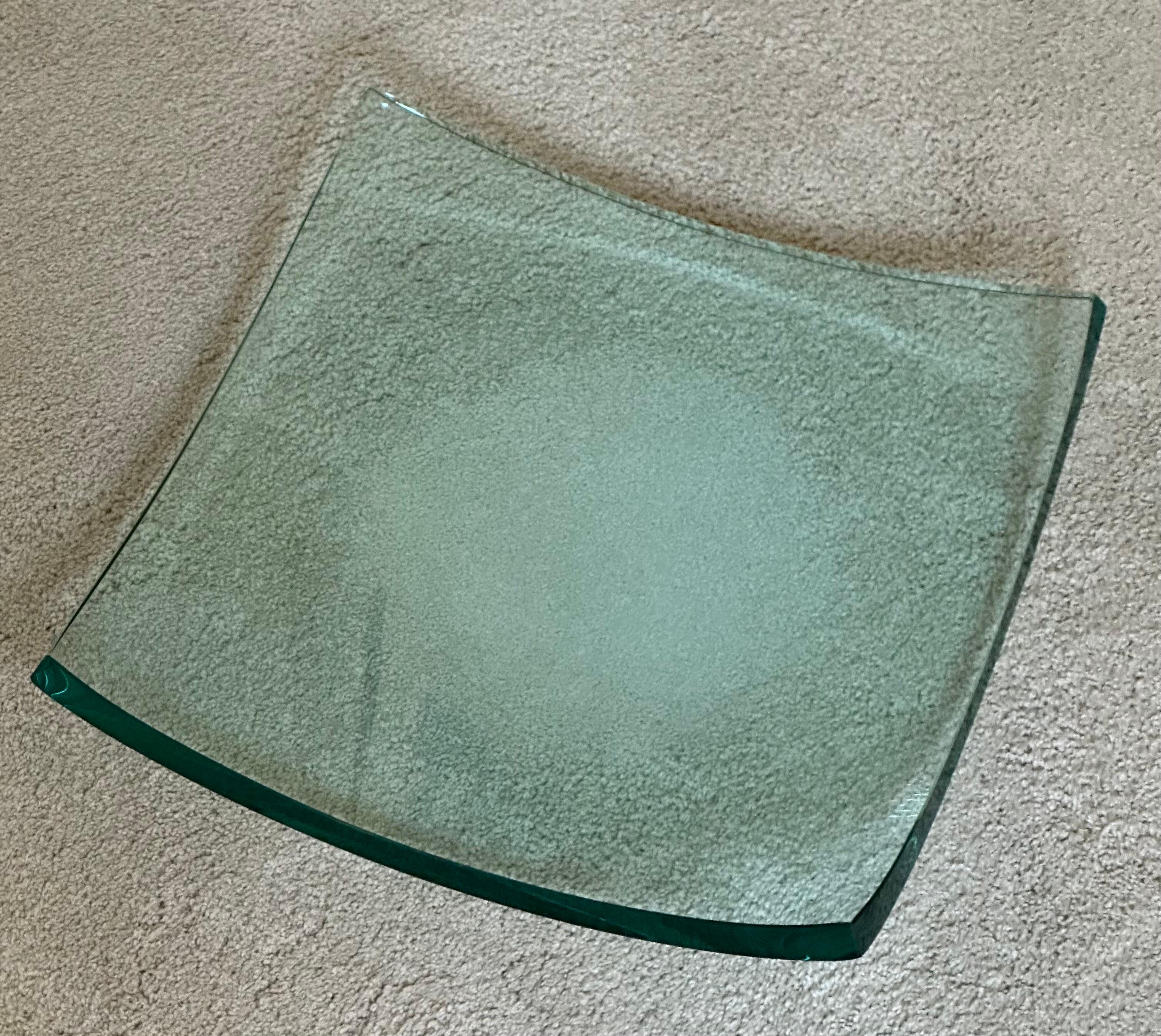 Minimalist modern Italian polished glass bowl / centerpiece in the style of Salvatore Polizzi, circa 1980s. The bowl is in very good vintage condition with no chips or cracks and measures a substantial 16