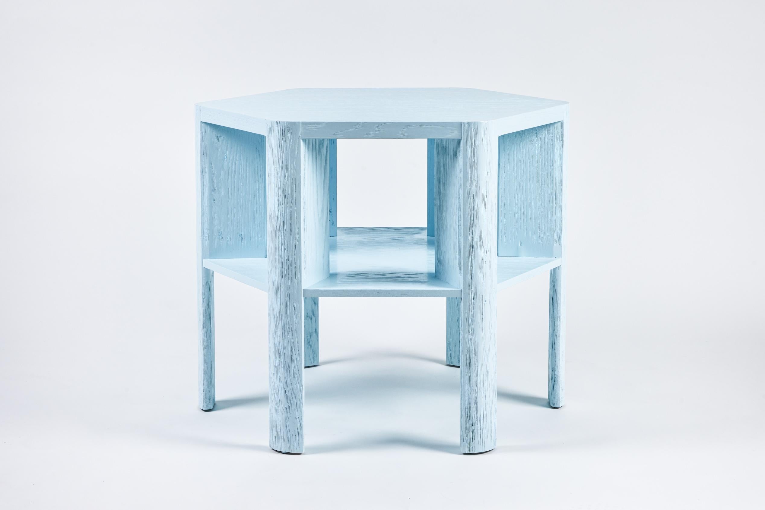 Martin & Brockett's Library Large Table, in Lacquer is a chic work horse. Stripped of unnecessary details, its minimalist design makes this table functional for sober book storage or as an efficient small space bar (bottle storage below frees up the