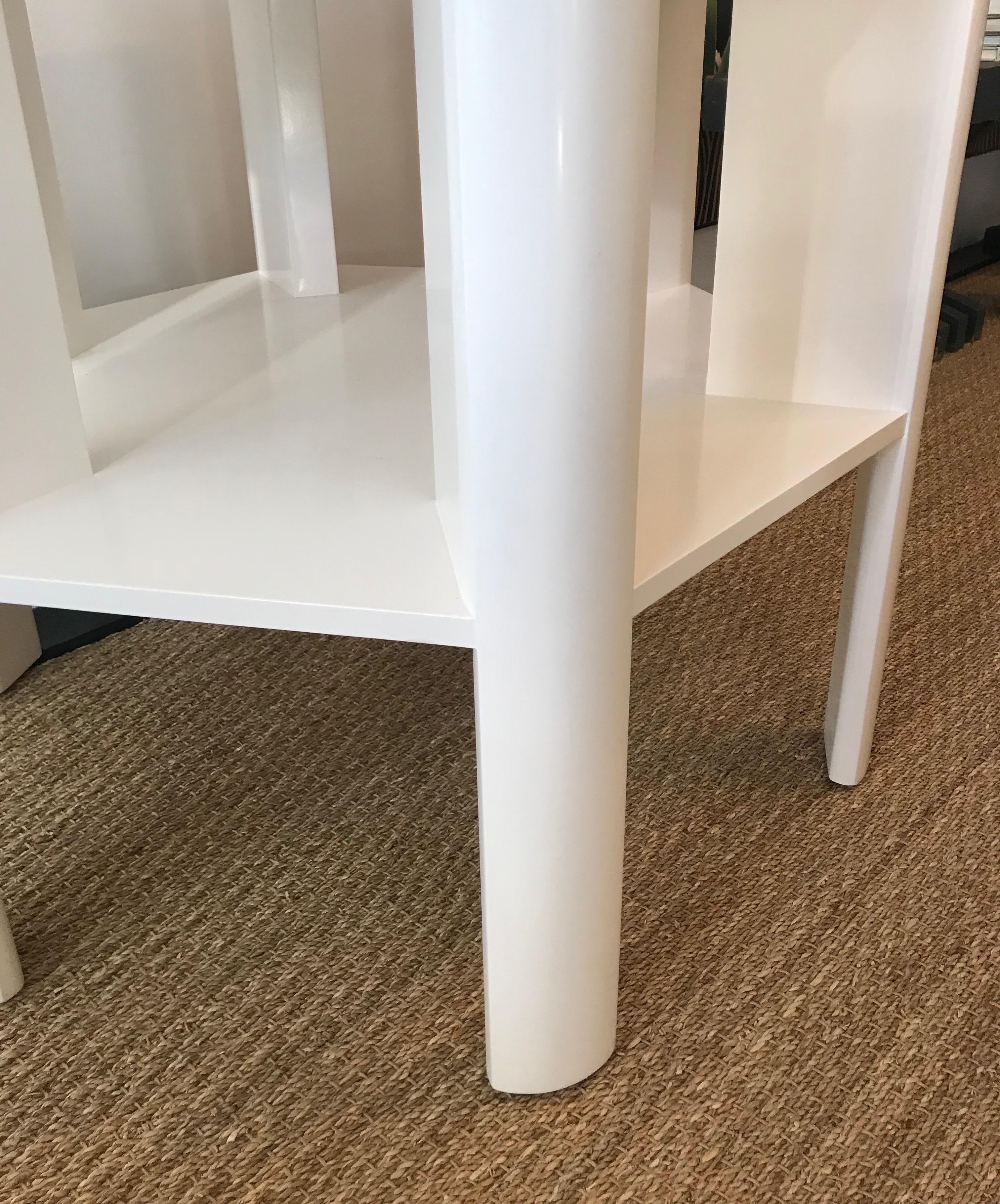 Martin and Brockett's library table is a chic work horse. Stripped of unnecessary details, its minimalist design makes this table functional for sober book storage or as an efficient small space bar (bottle storage below frees up the table top for