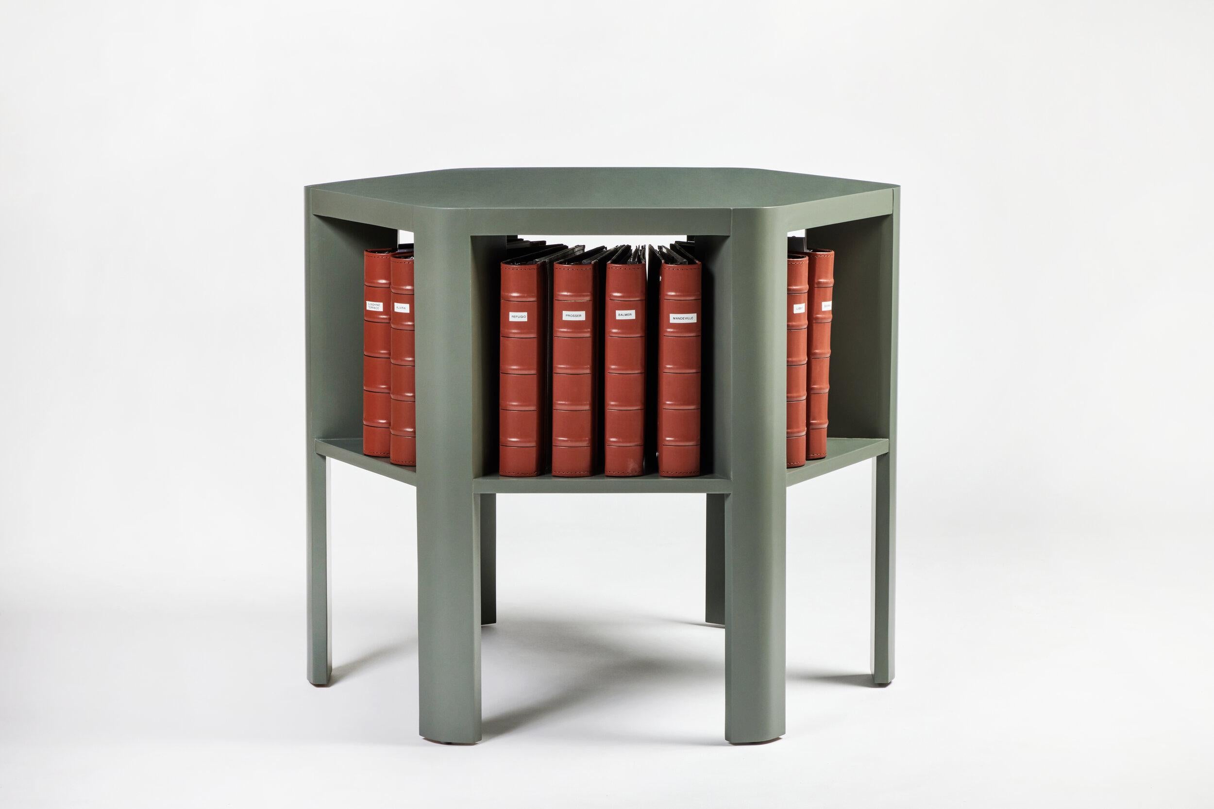 Martin & Brockett's Library Table is a chic work horse. Stripped of unnecessary details, its minimalist design makes this table functional for sober book storage or as an efficient small space bar (bottle storage below frees up the table top for