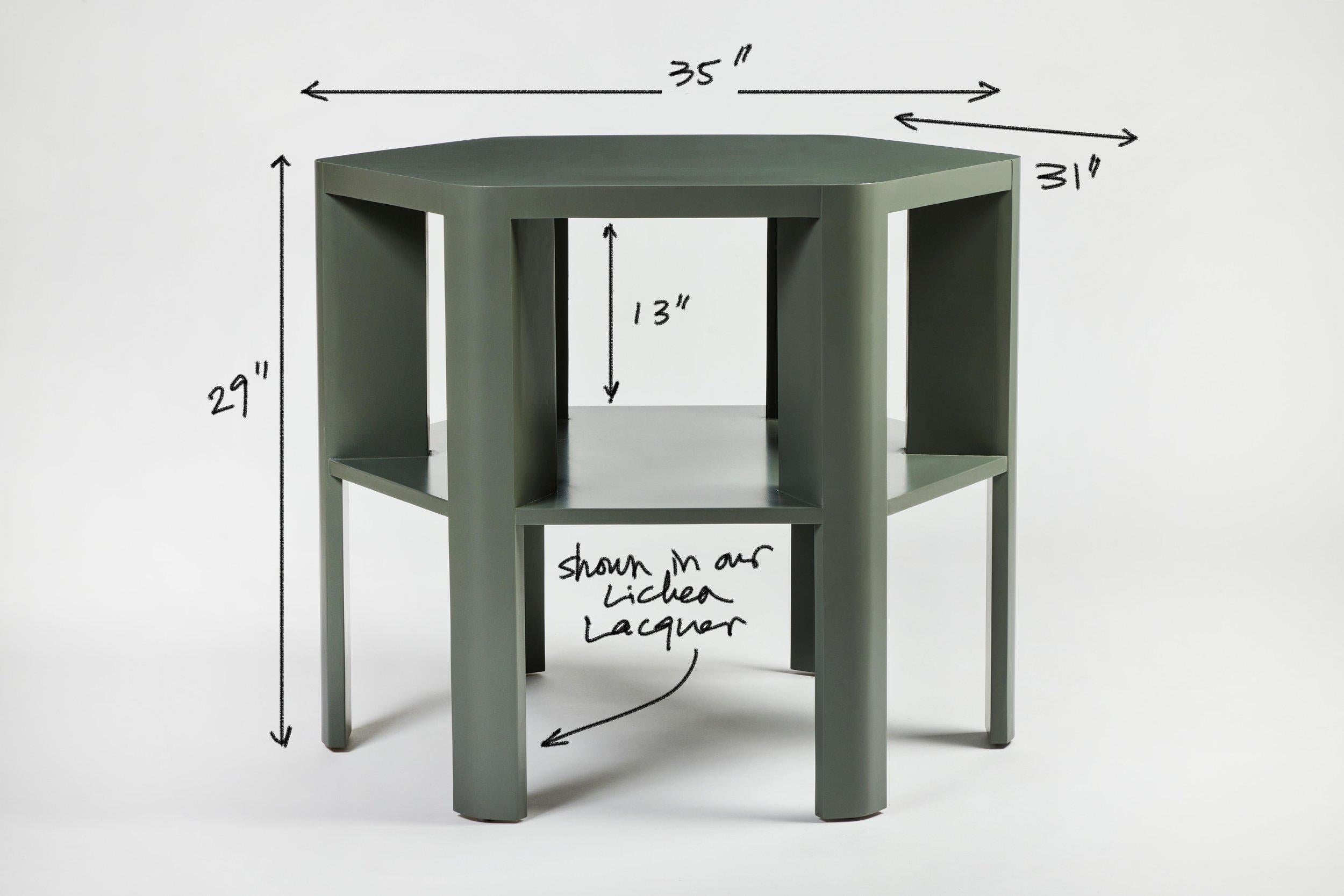 Martin and Brockett's Library Table is a chic work horse. Stripped of unnecessary details, its minimalist design makes this table functional for sober book storage or as an efficient small space bar (bottle storage below frees up the table top for