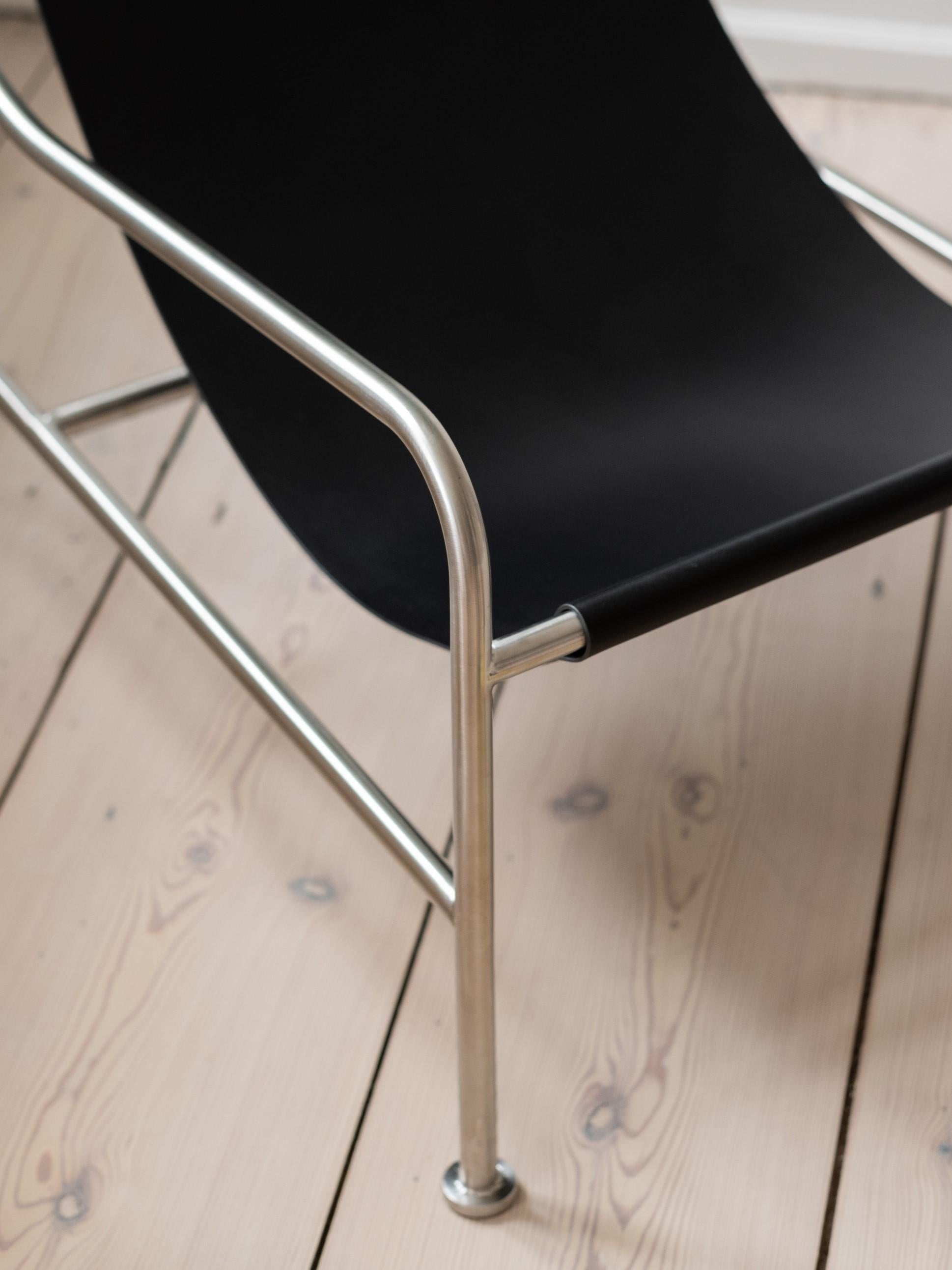 Hand-Crafted Minimalist Modern Lounge Chair in Black Leather and Brushed Stainless Steel For Sale