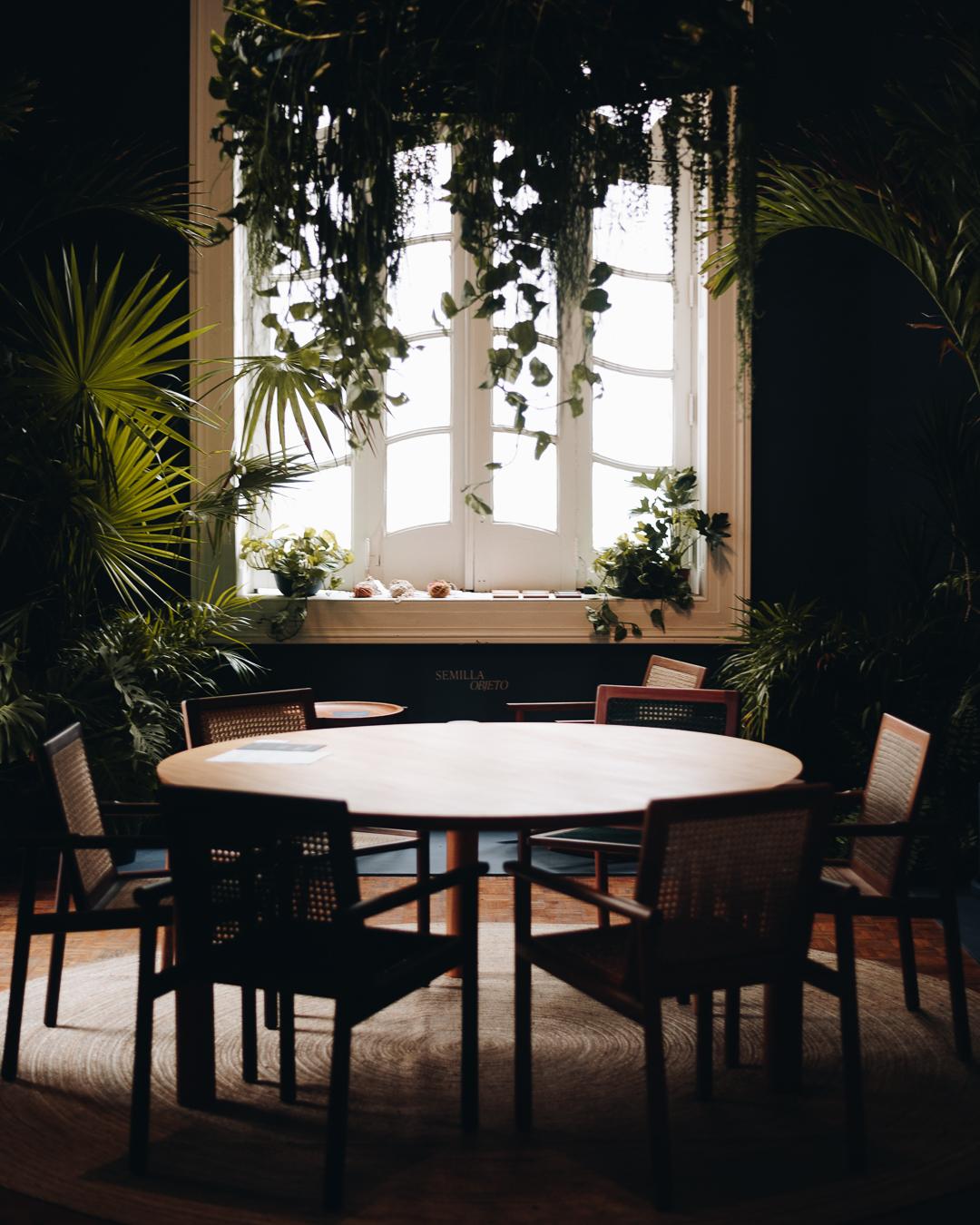 Contemporary Wooden Round Dining Table in Solid Carribean Walnut For Sale