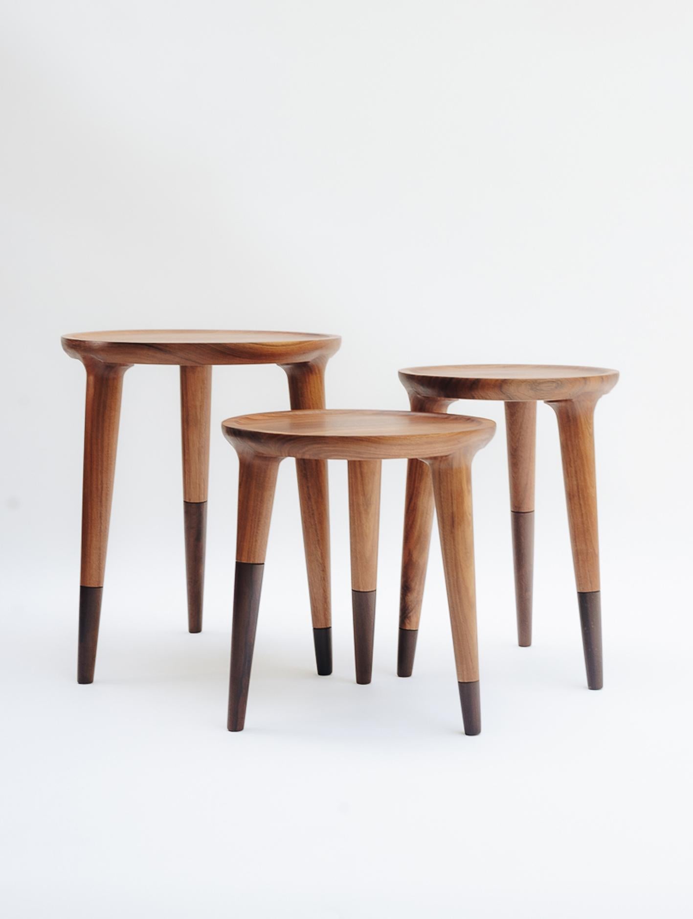 The Chamak Set consists of three Chamak Tables of different complementary sizes. The Chamak is a simple and elegant side table with fine lines that emphasize the natural beauty of the perfectly turned tropical wood. Excellent production techniques