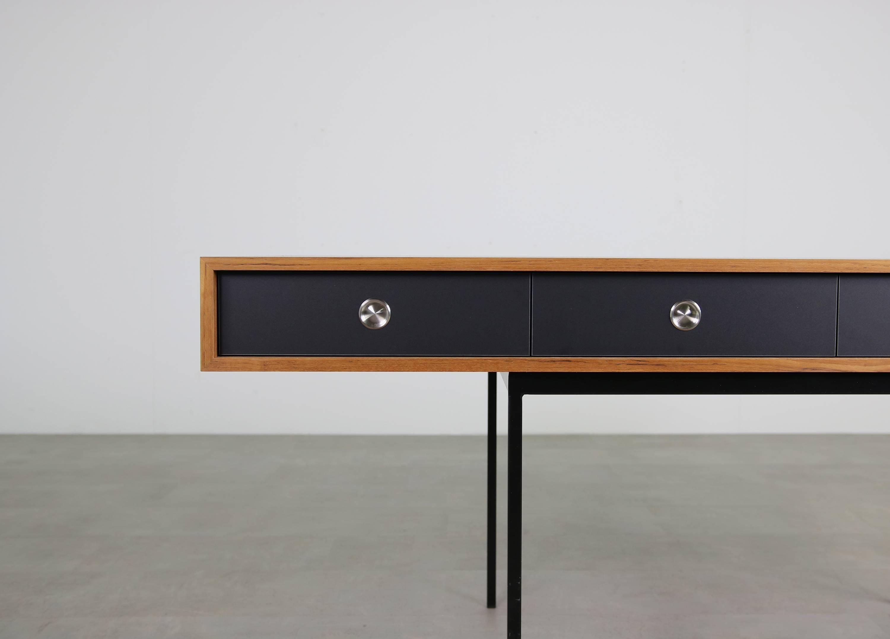 The Nathan Lindberg desk. Model NL40 in beautiful teak wood and metal base, black edition, with black HPL drawers. Super high quality writing table, freestanding, maple wood inside the drawers, stainless steel handles. Measures: Desk 180 x 80 x 76