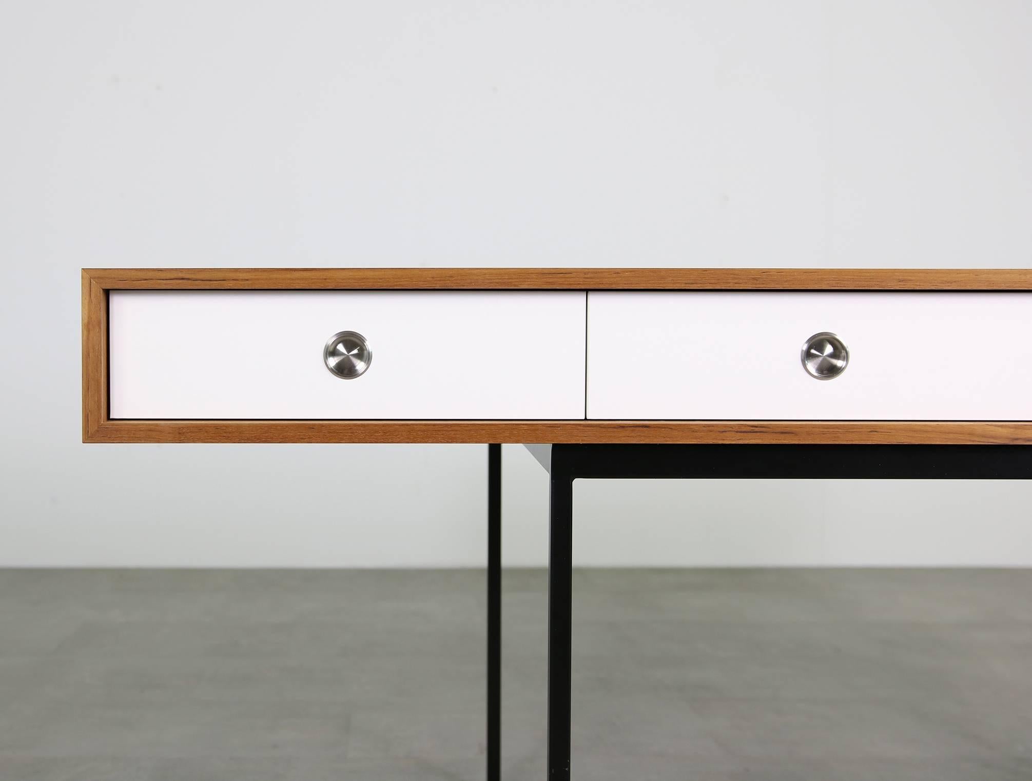 The Nathan Lindberg desk. Model NL40 in beautiful teak wood and metal base, white edition, with white HPL drawers. Super high quality writing table, freestanding, maple wood inside the drawers, stainless steel handles. Measures: Desk 180 x 80 x 76