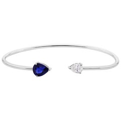 Bracelet manchette minimaliste en or blanc 18k avec saphir bleu naturel et diamant