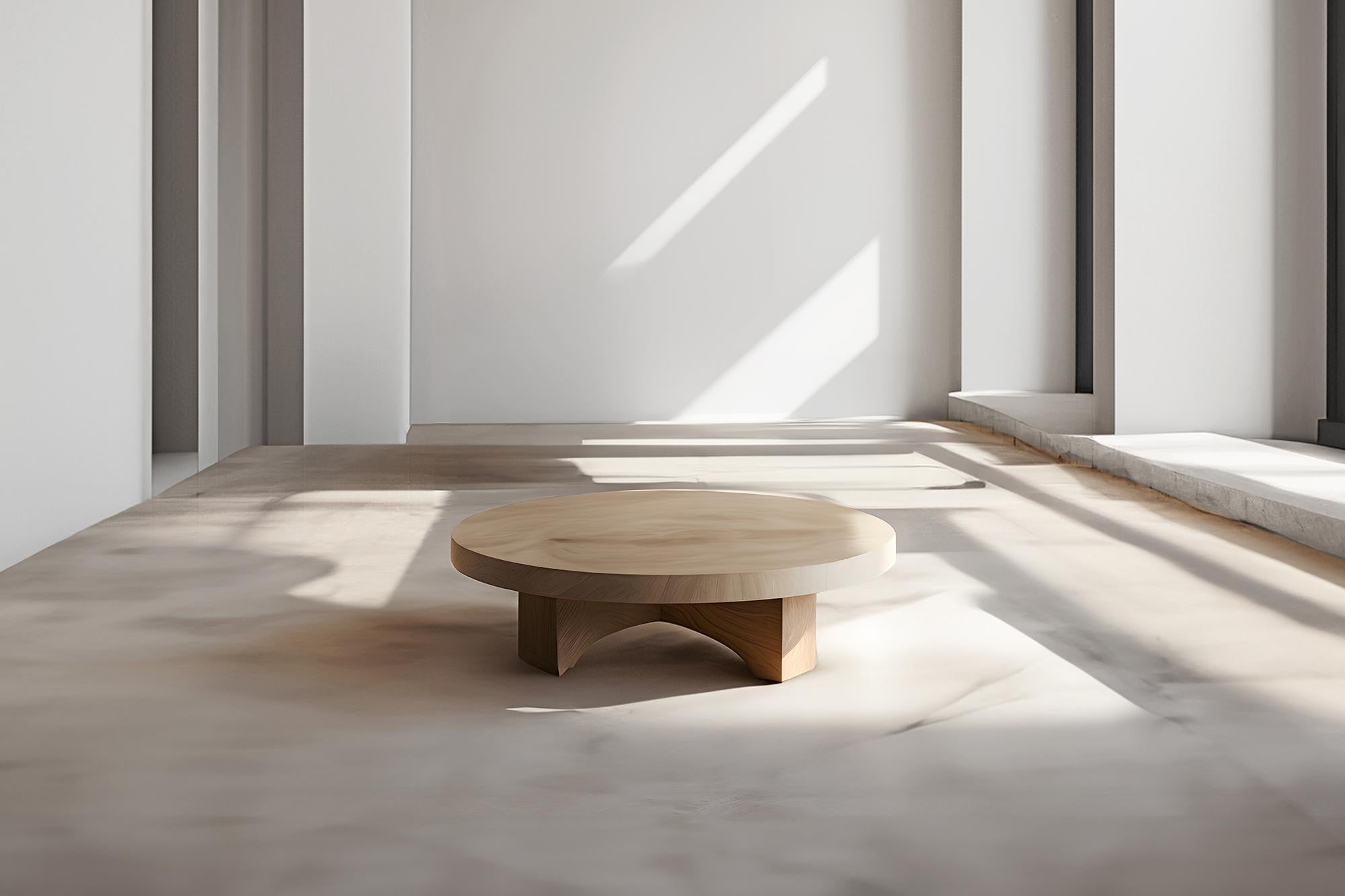 Minimalist Natural Oak Coffee Table - Zen Fundamenta 38 by NONO

Sculptural coffee table made of solid wood with a natural water-based or black tinted finish. Due to the nature of the production process, each piece may vary in grain, texture, shape