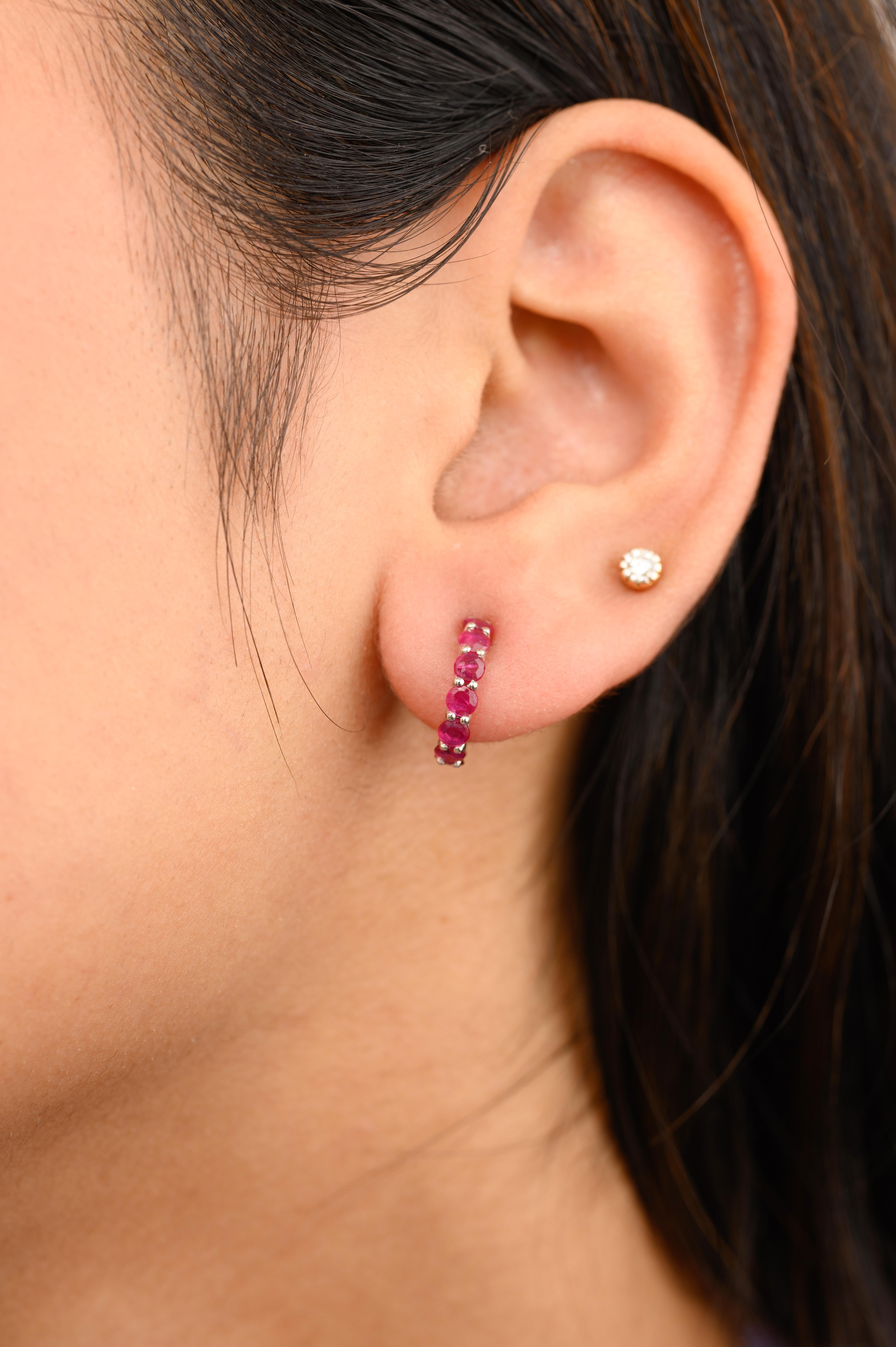 Minimalist Natural Ruby Tiny Hoop Earrings in 18K Gold to make a statement with your look. You shall need stud earrings to make a statement with your look. These earrings create a sparkling, luxurious look featuring round cut ruby.
Ruby improves