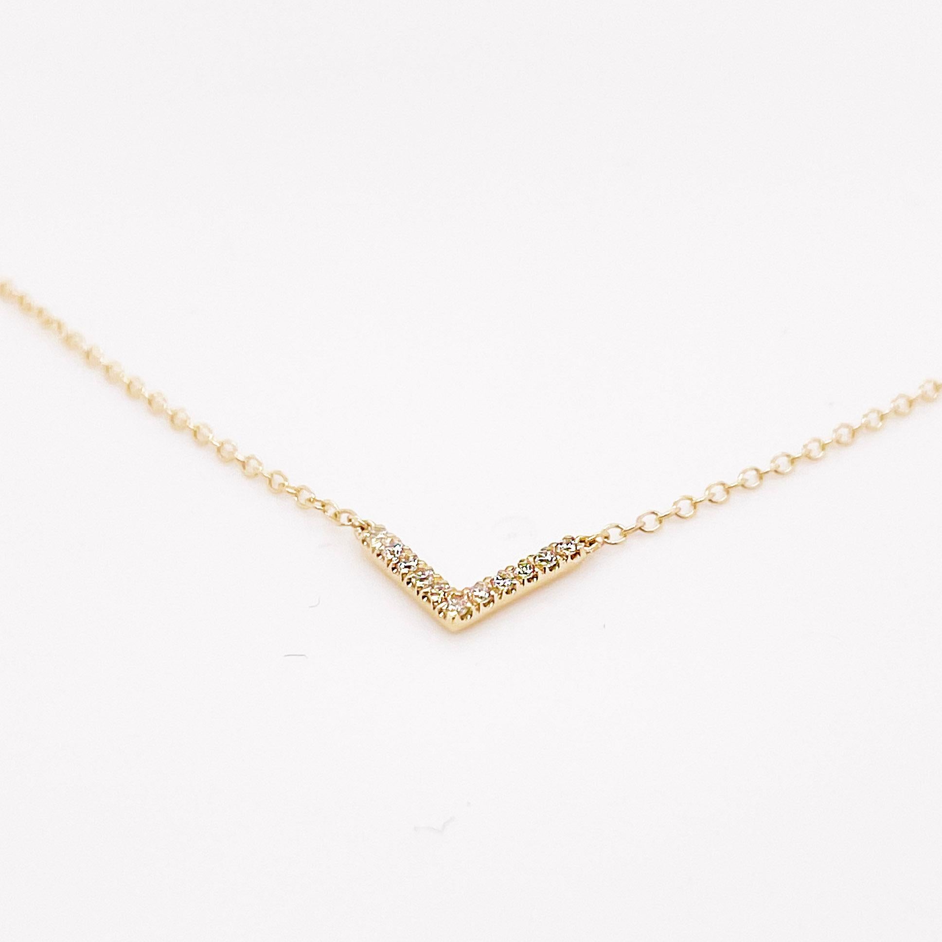 The diamond “V” necklace has 12 gorgeous diamonds that make a simple, small V. The chain is a solid 14 karat yellow gold cable chain that has a loop at 18 and 17 inches so that you can wear it at different lengths. This special detail is liked by