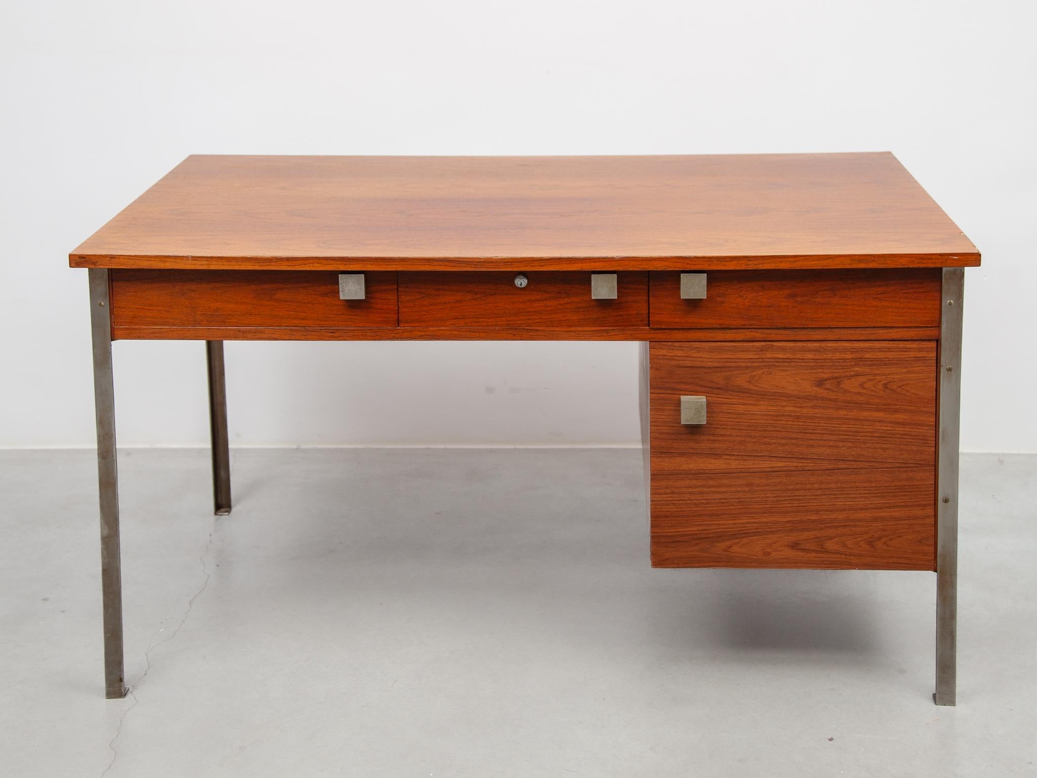 Beautiful Modern minimalist office desk designed  by Alfred Hendrickx for Belform, Belgium, 1960s. A contemporary design which will bring warmth as well a luxurious feeling into your living- meeting space or office. The desk features 3 drawers and 1