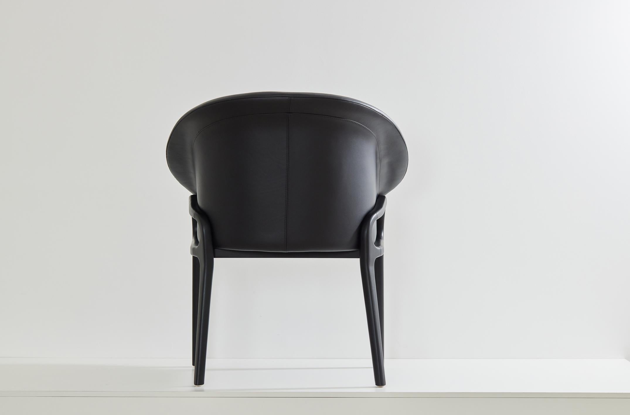 Contemporary Minimalist Organic Chair in black Solid Wood, black leather Seating For Sale