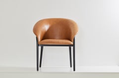 Silla orgánica minimalista de madera maciza negra y piel camel Tono del asiento